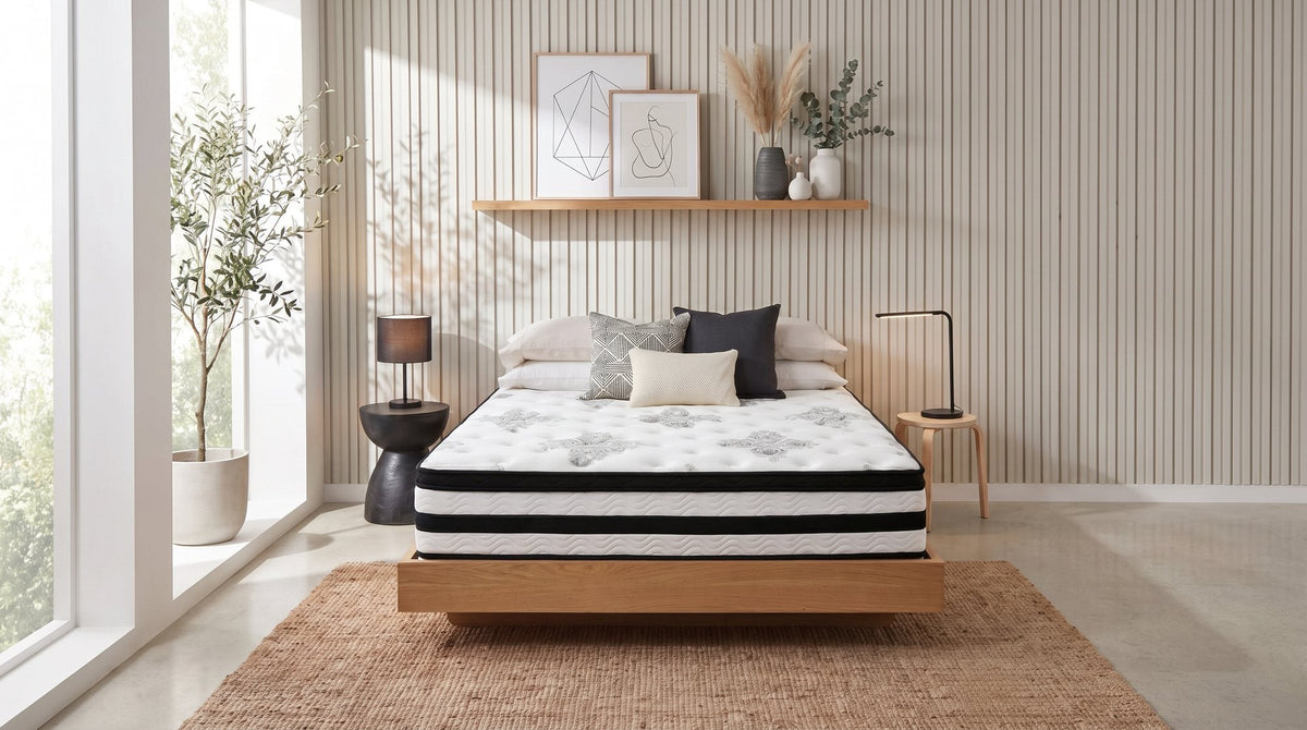 Supreme Care 5 Zone Memory Foam Mattress on a low timber bed base in a bright bedroom