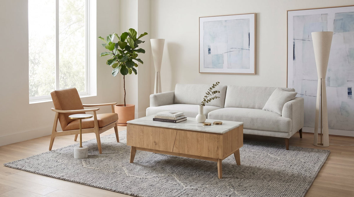 Macleod Coffee Table with a marble-look top, two drawers and tapered legs in a bright living room