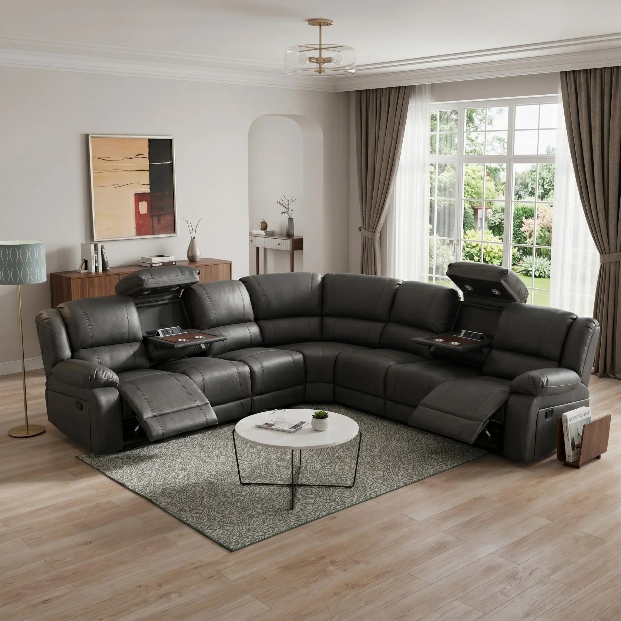 Black corner sofa in a living room setting with a coffee table and decor items.