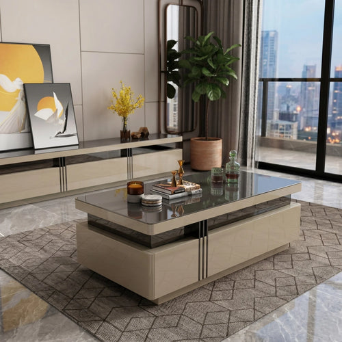 Modern living room with a coffee table, decorative items, and cityscape view.