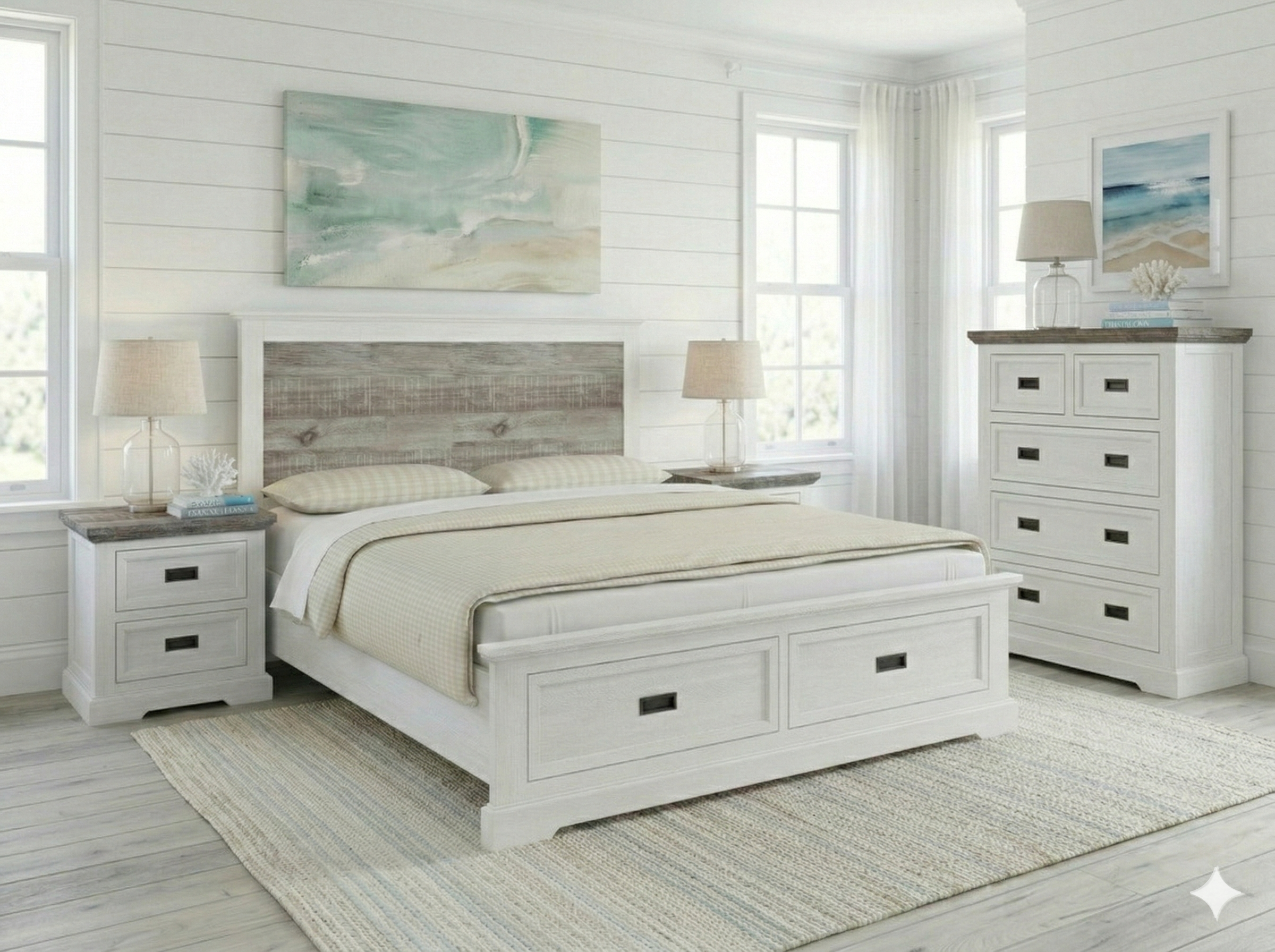 White bedroom set with bed, nightstands, and dresser in a bright room.