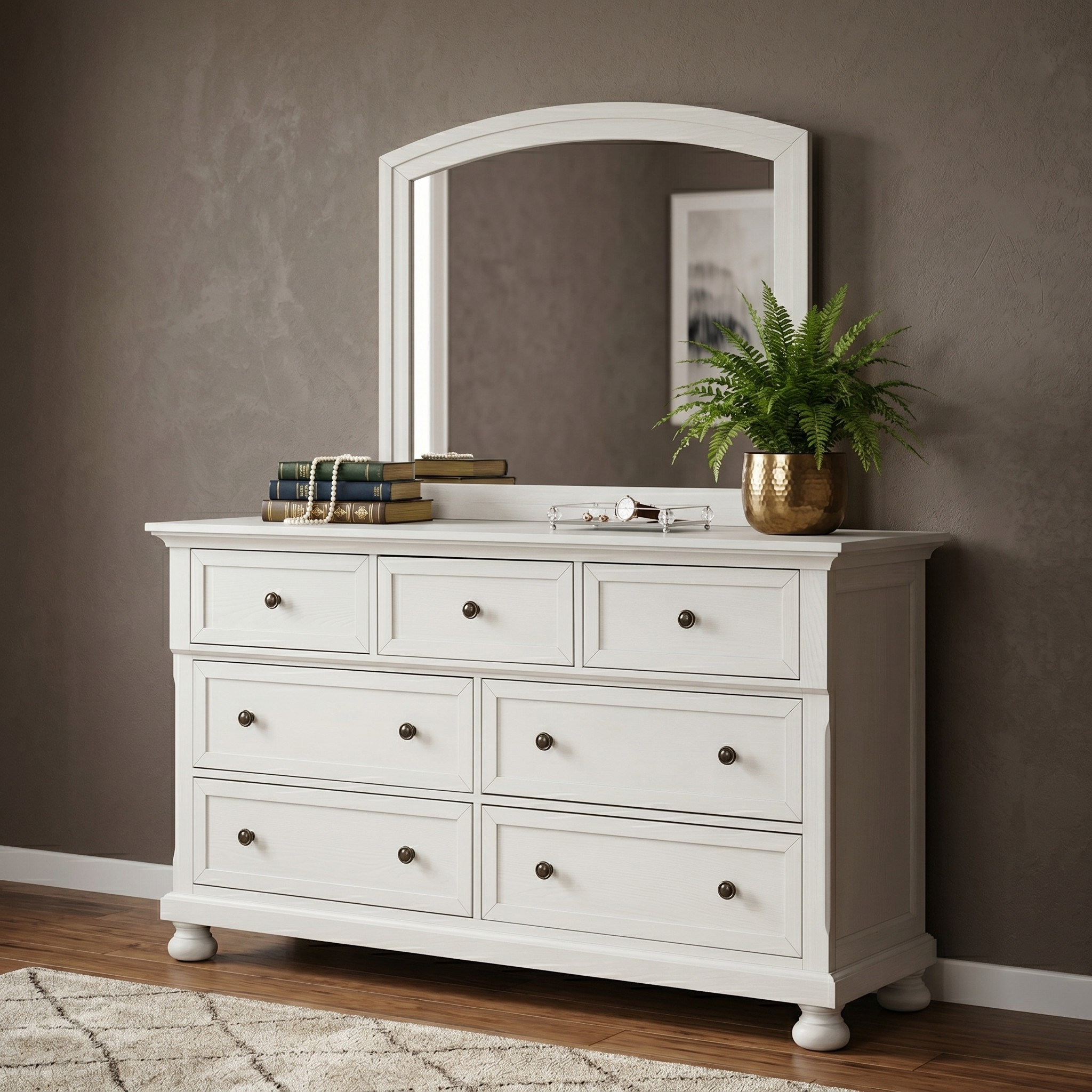 White dresser with mirror against a brown wall