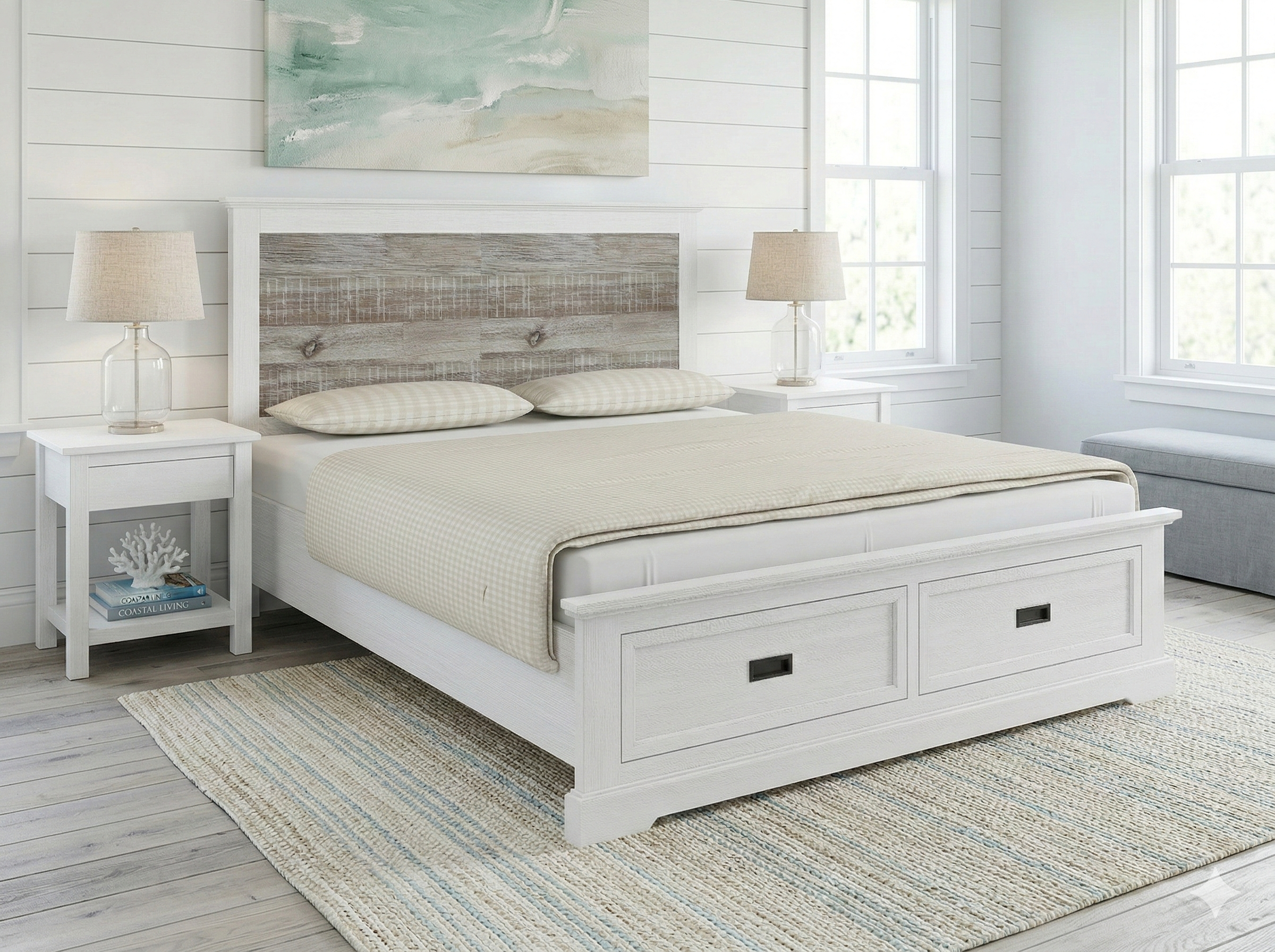 White bedroom with a bed, nightstands, and artwork on the wall.