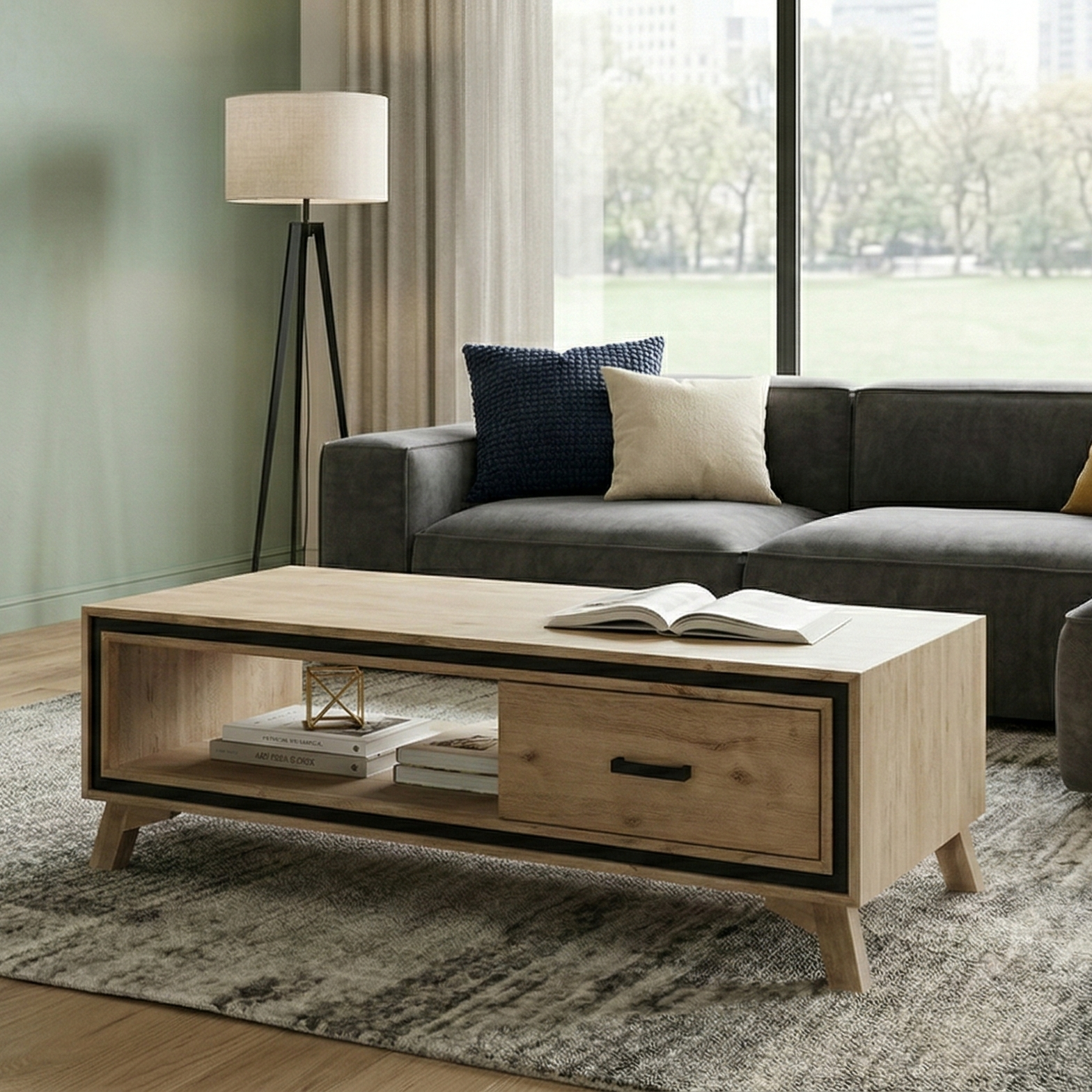 Modern living room with a grey sectional sofa, wooden coffee table, and large windows.