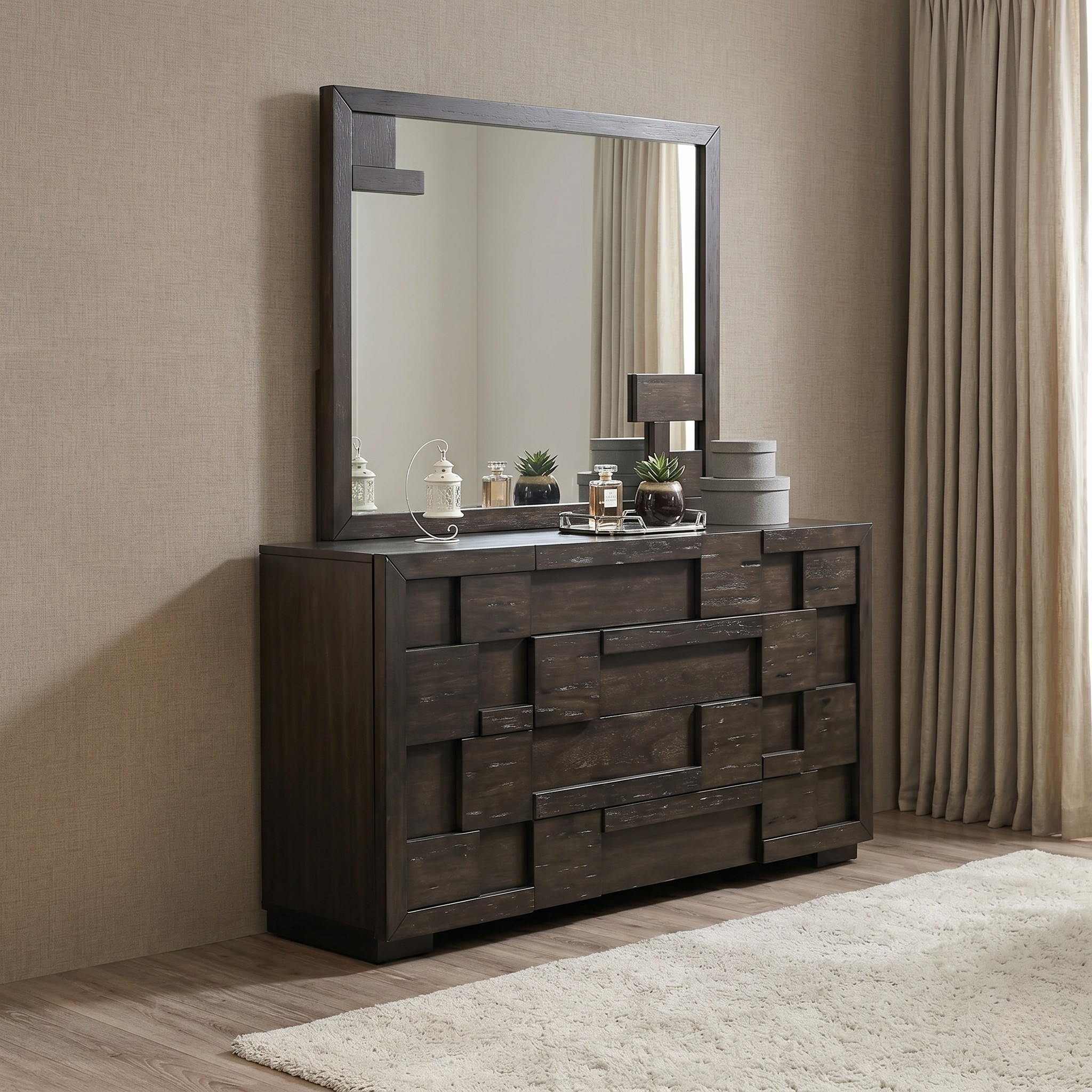 Wooden dresser with mirror in a room with beige walls and curtains.
