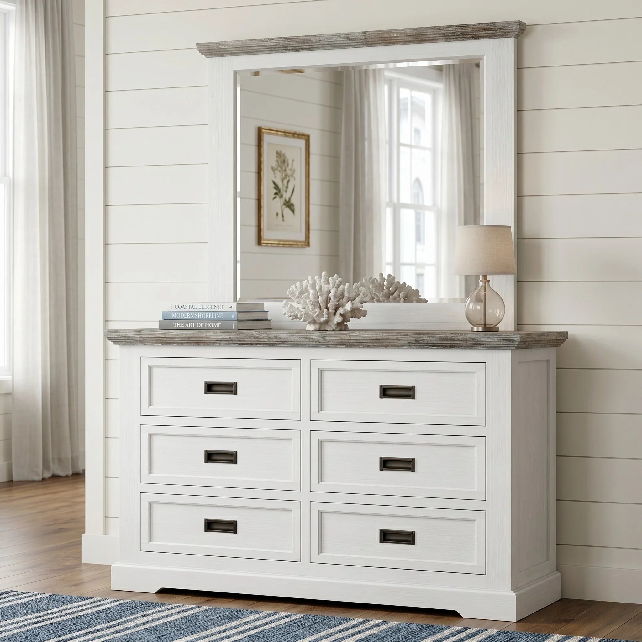 White dresser with mirror in a room with wooden flooring and white walls.