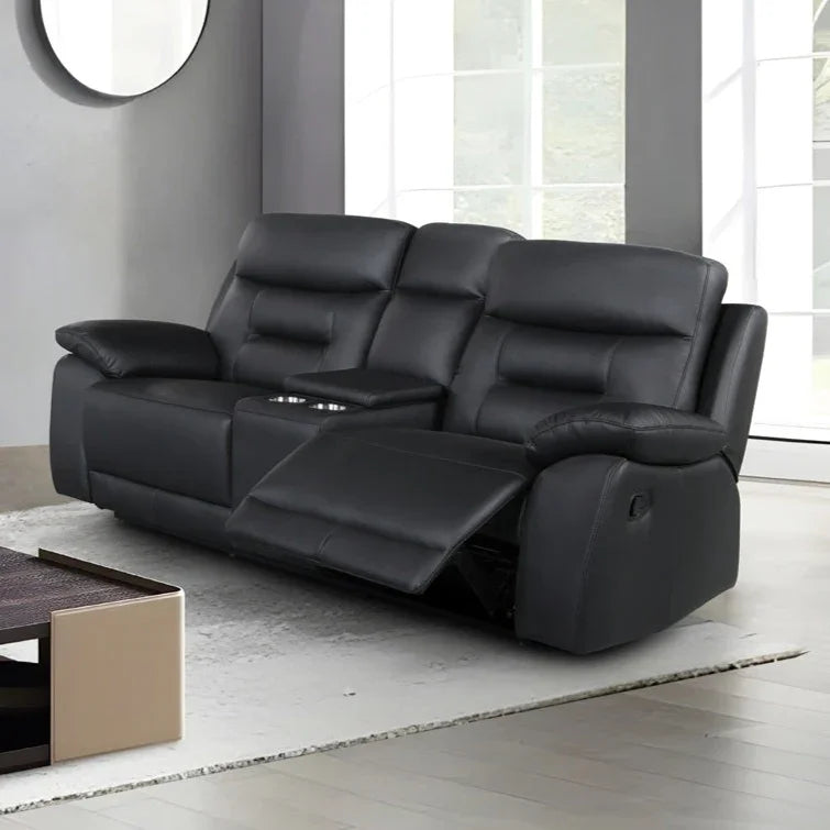 Black leather recliner sofa in a modern living room setting