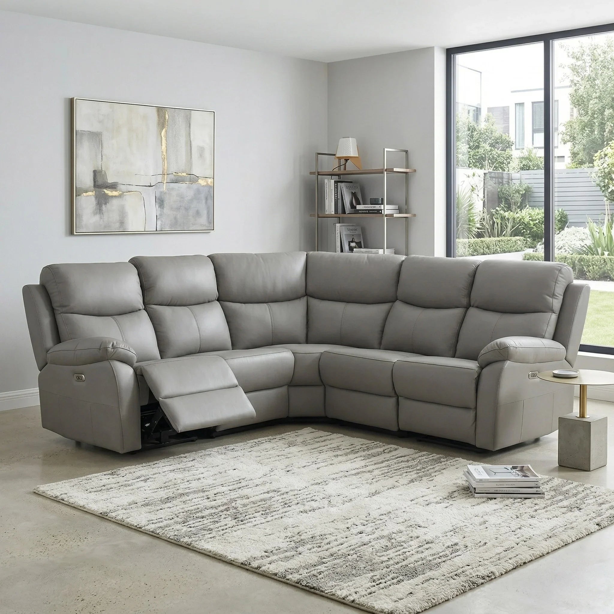 Gray sectional sofa in a living room with a rug and decorative items.