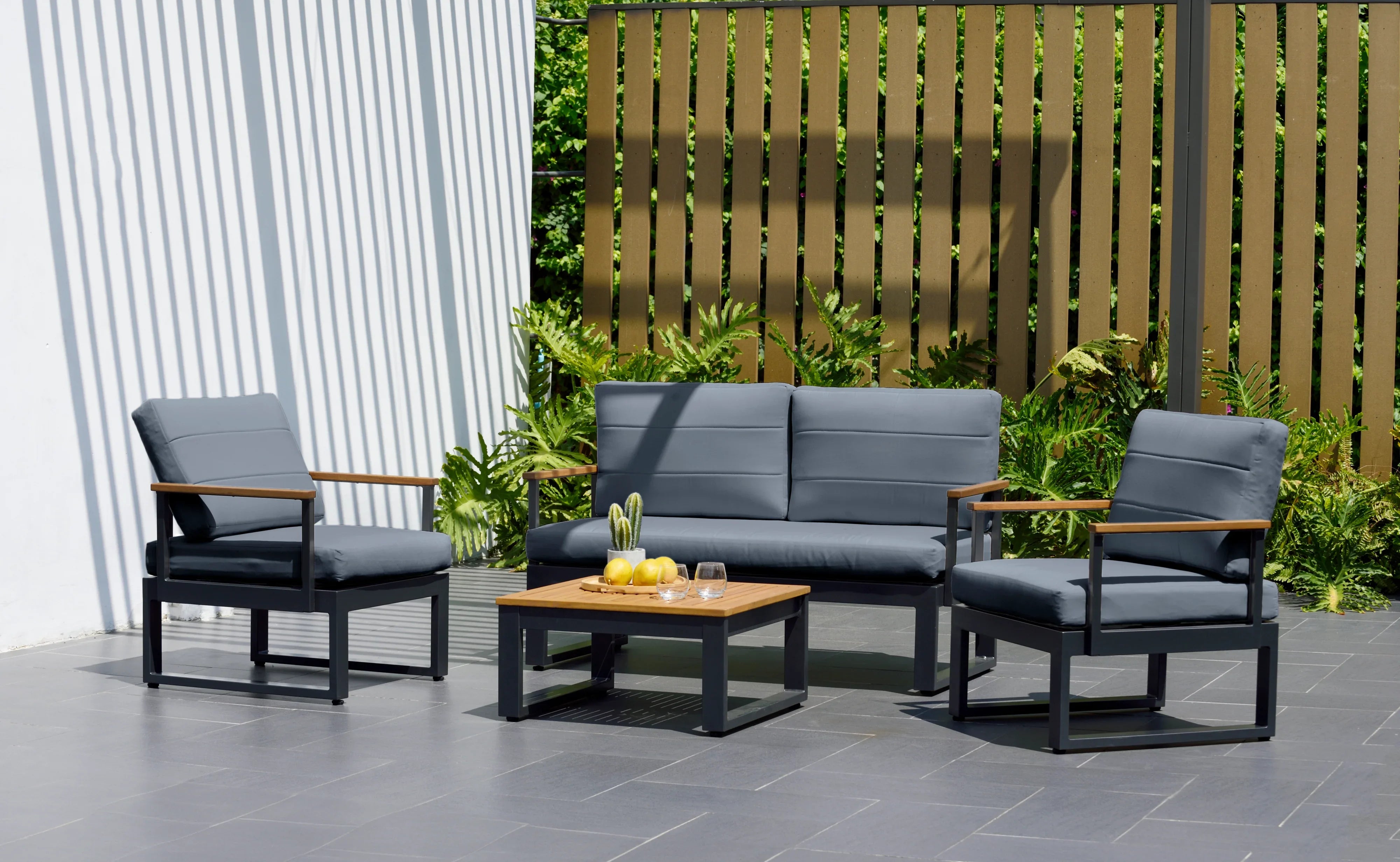 Tagula 4 Piece Outdoor Sofa Set with Black Cushions