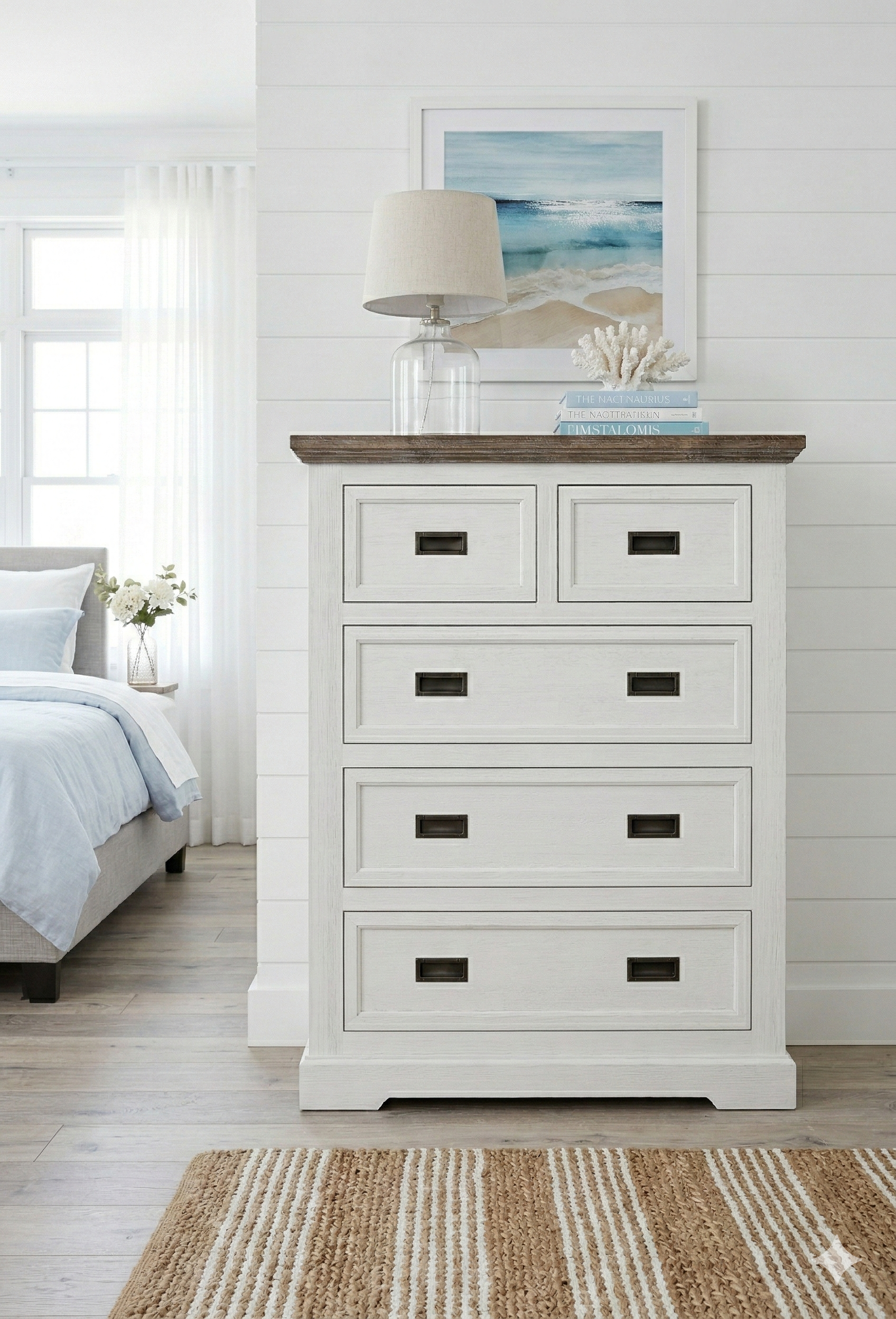White tallboy with wooden top in a bedroom setting