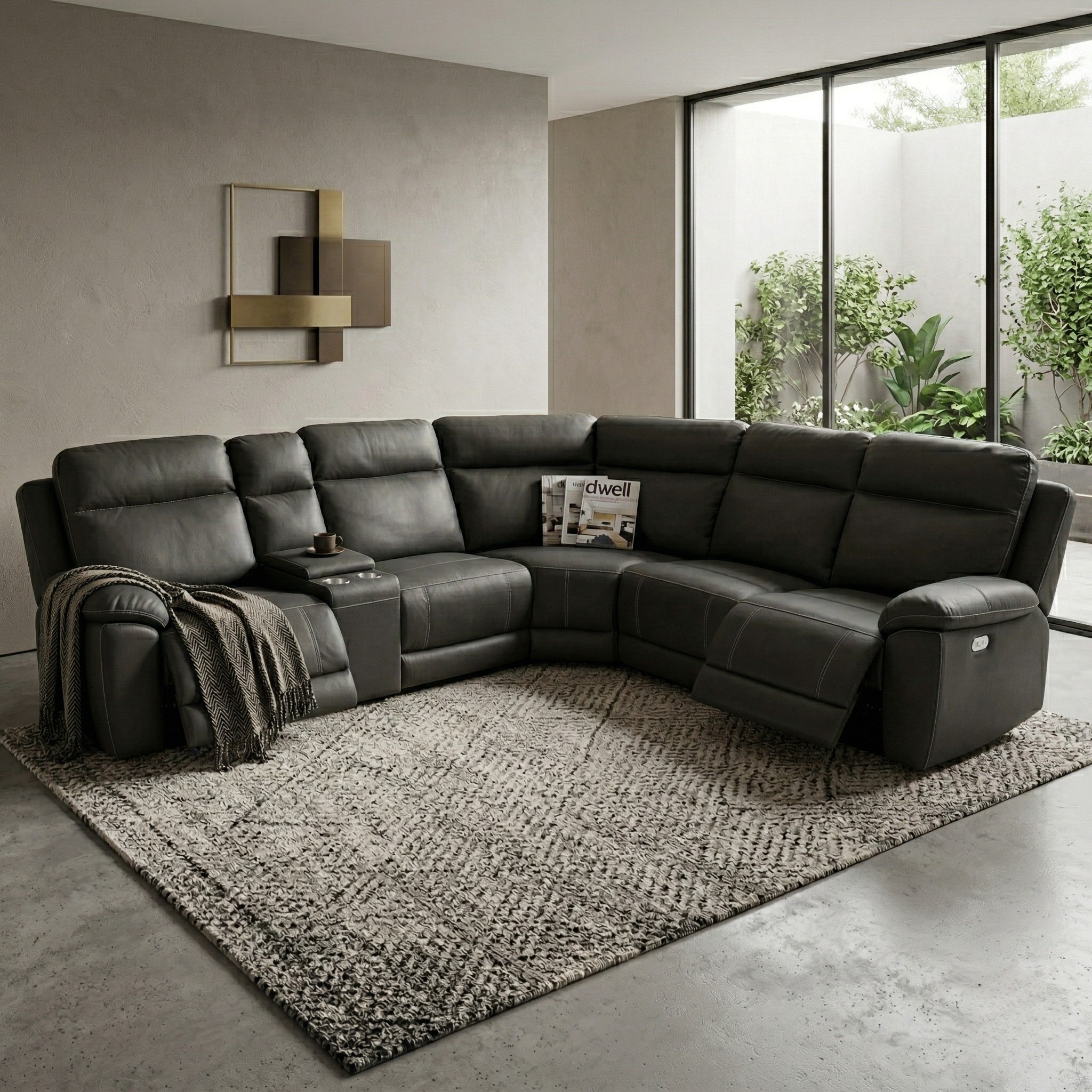 Modern living room with a large black leather sectional sofa on a textured rug.