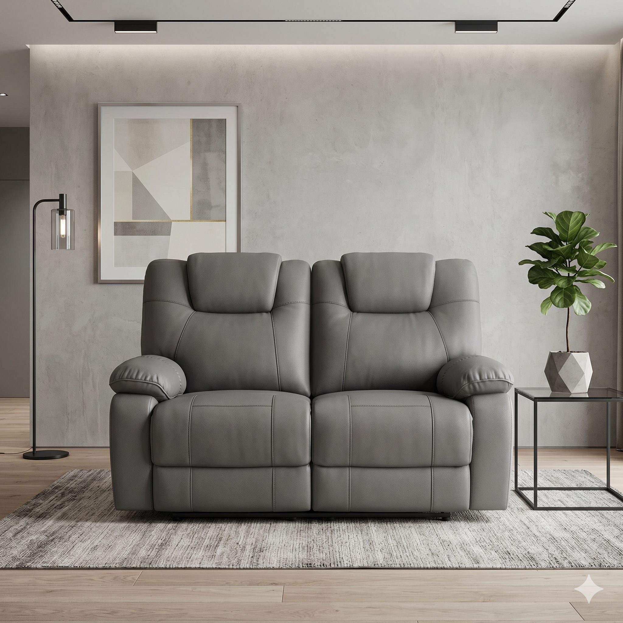 Gray leather sofa in a modern living room with a plant and abstract art on the wall.