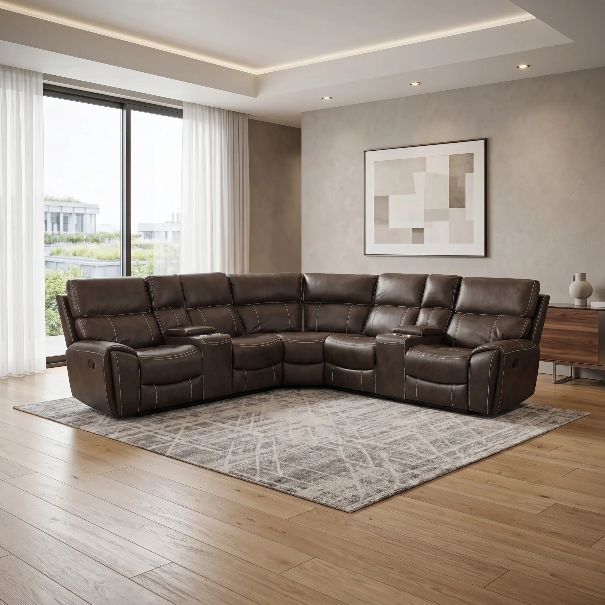 Brown fabric sectional sofa in a modern living room with large windows and abstract art on the wall.