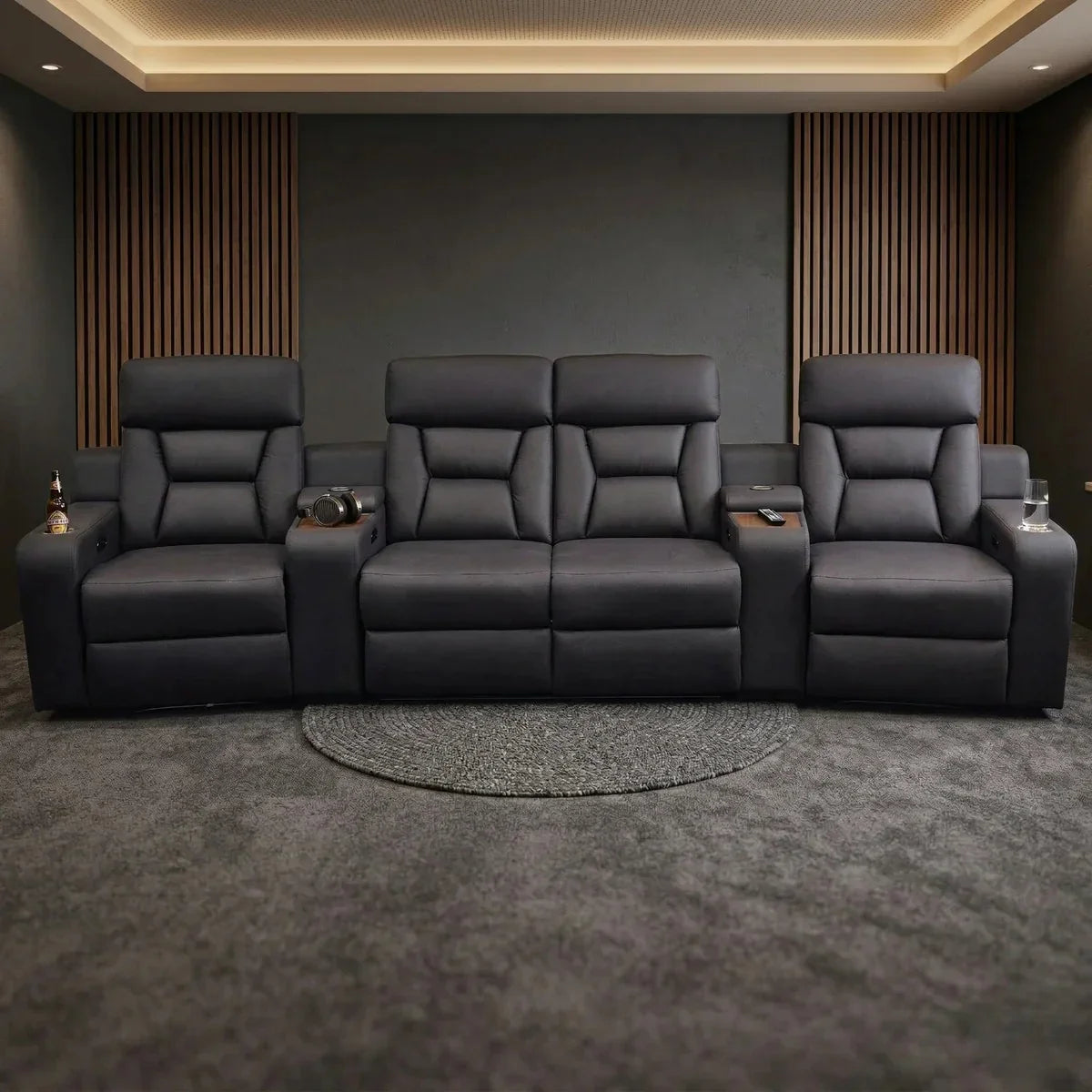Bonza 4-Seat Theatre Electric Recliner Lounge in dark upholstery, featuring plush cushioned seats and reclining functionality, perfect for a modern living room lounge setup.
