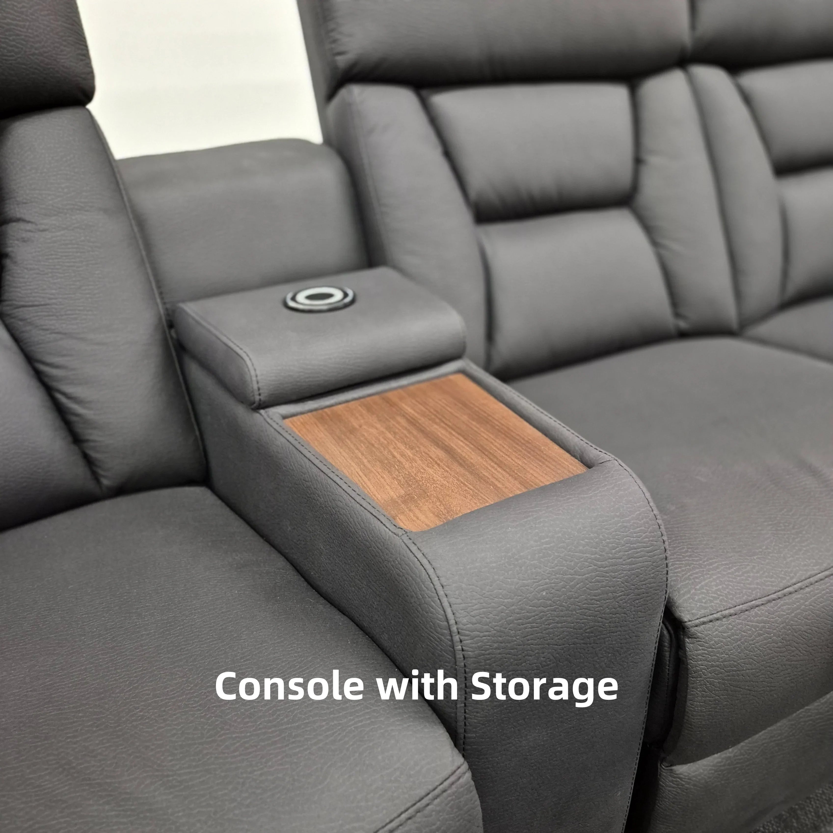 Close-up of grey theatre recliner lounge with console storage and cup holder