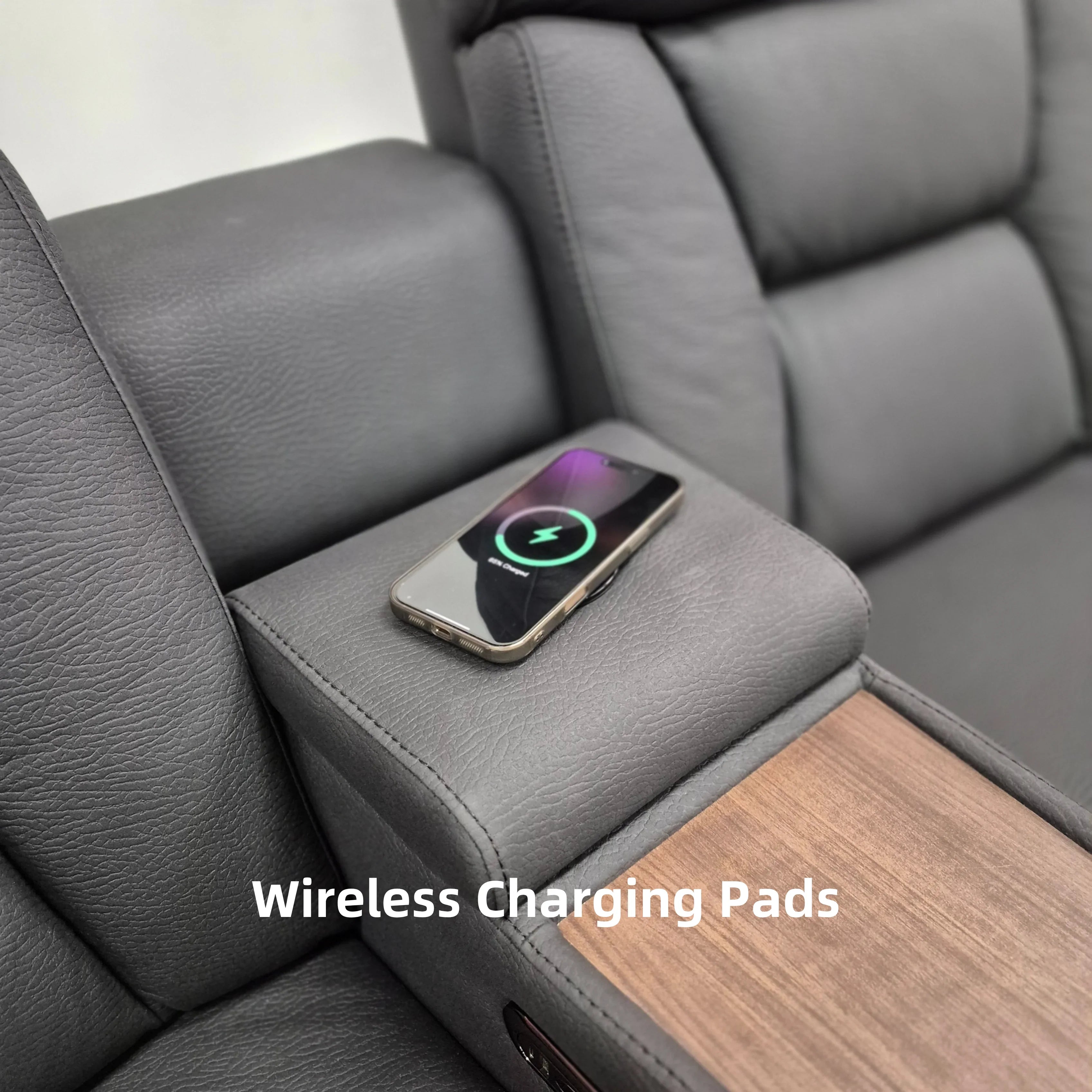 Grey electric recliner lounge with wireless phone charging pad and cup holder console