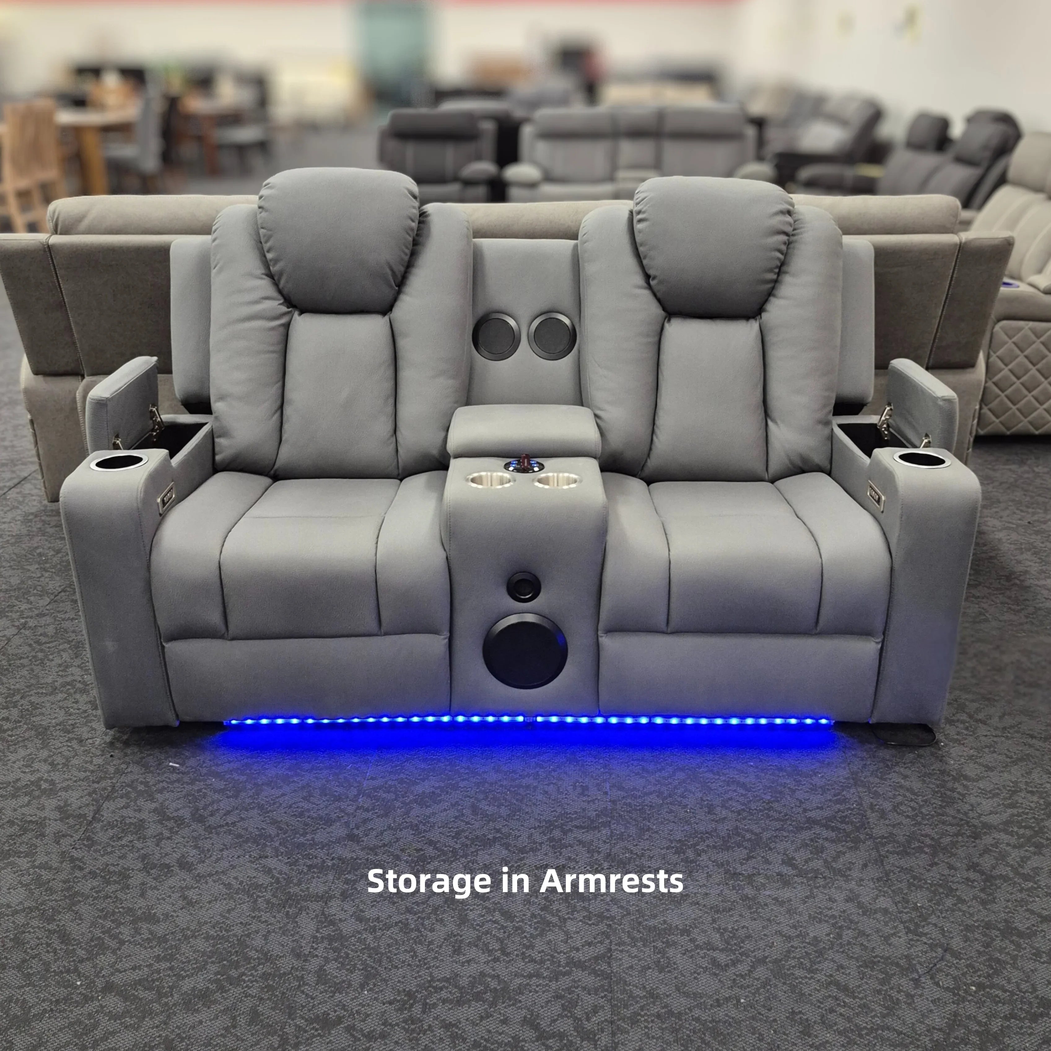 Grey 2 seater electric recliner lounge with armrest storage, cup holders, blue LED lighting