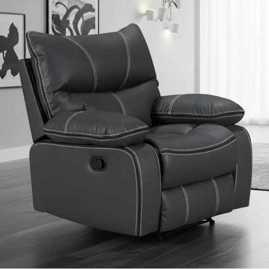 A black Brooke recliner chair with plush cushions, shown in a living room setting.