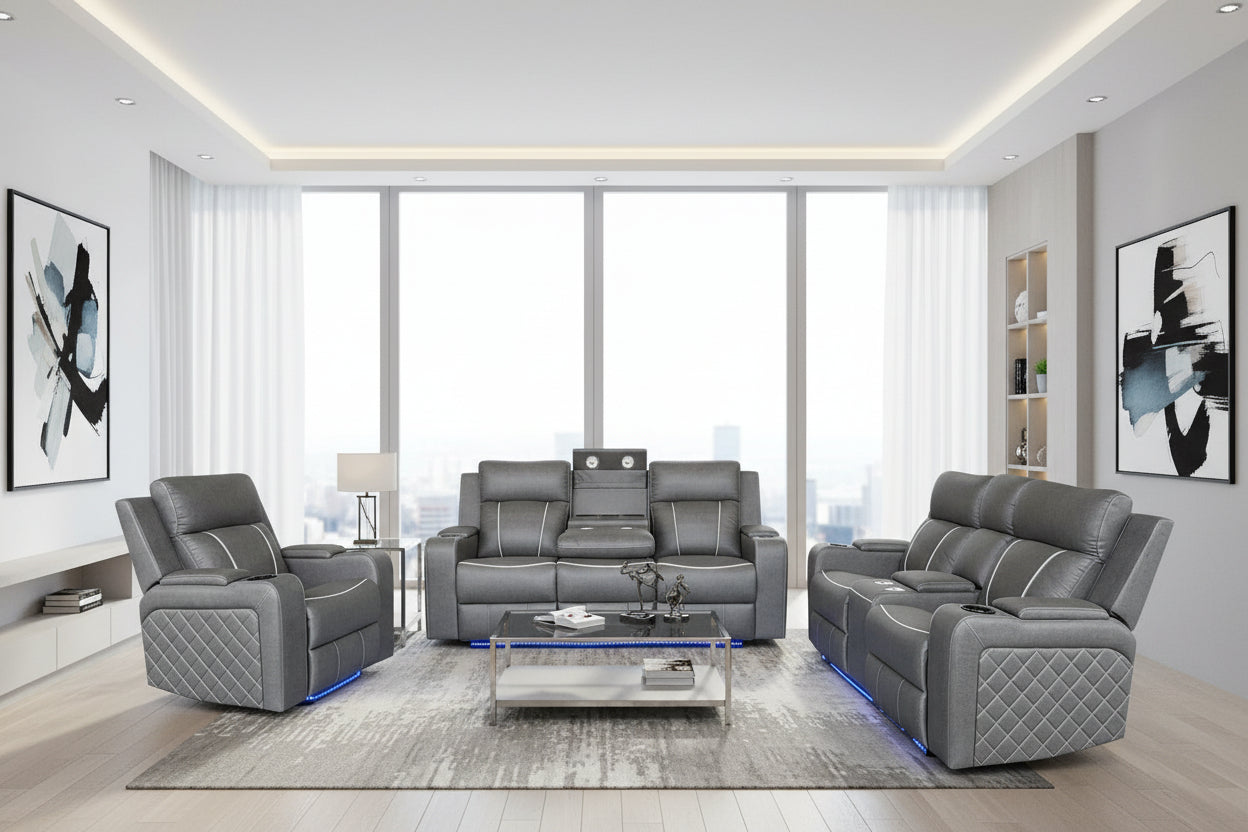 Grey fabric sofa set in a modern living room with large windows.
