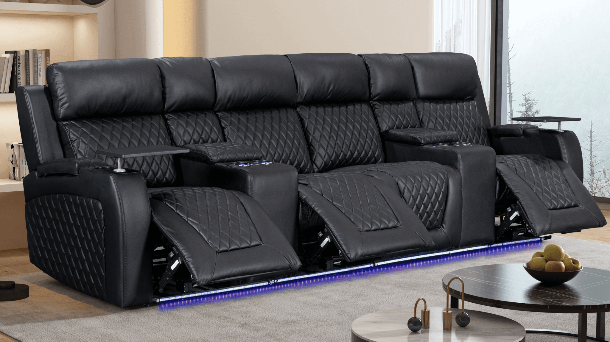 A black leather theater recliner sofa with electric reclining seats, cup holders, tray tables, and LED lights.