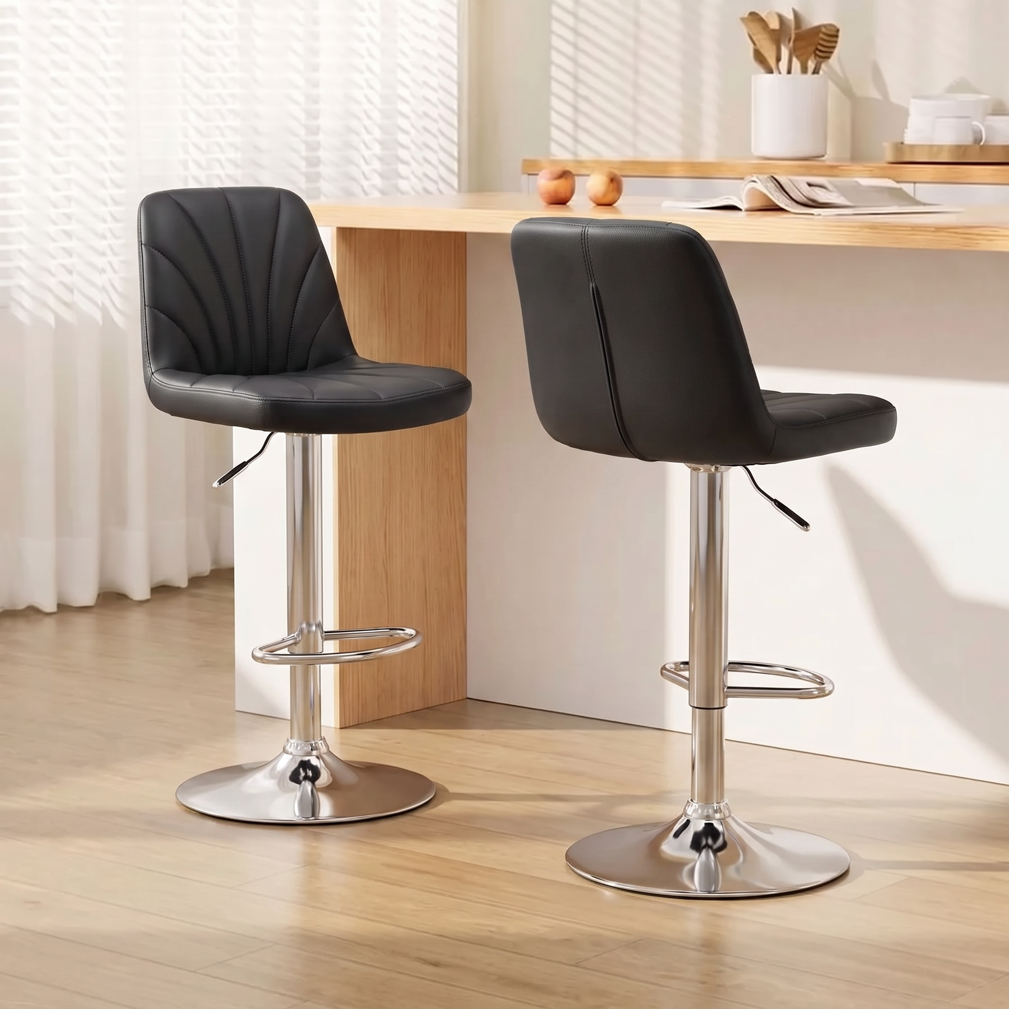 Chroma Bar Stools in black PU leather with fan-stitched backs and polished chrome bases at a kitchen bench