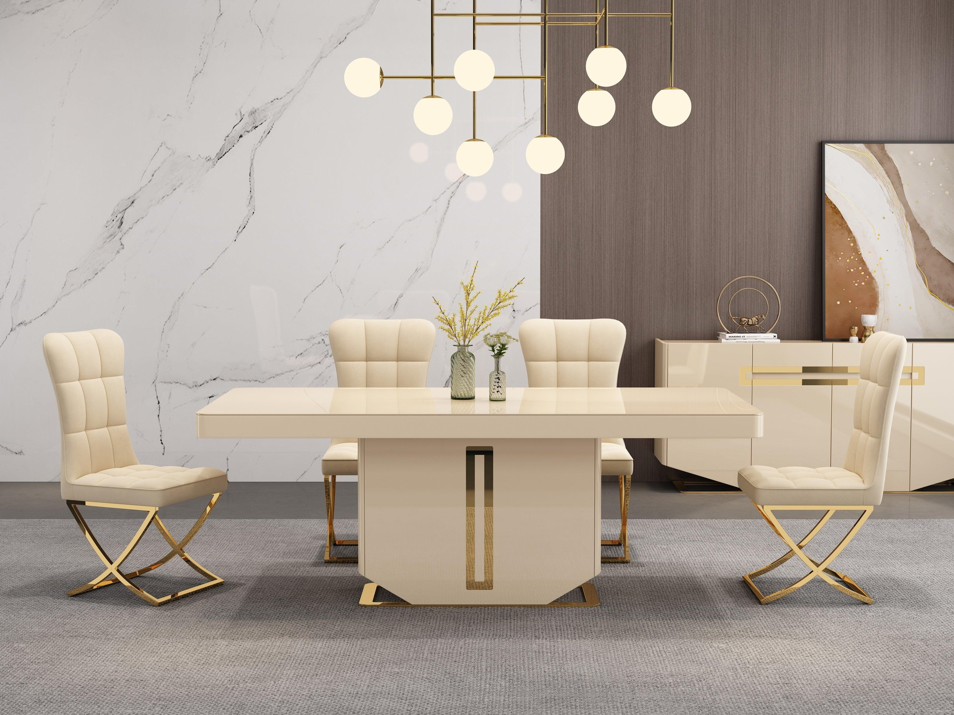 Modern beige dining table set with gold accents and padded chairs in a contemporary dining room