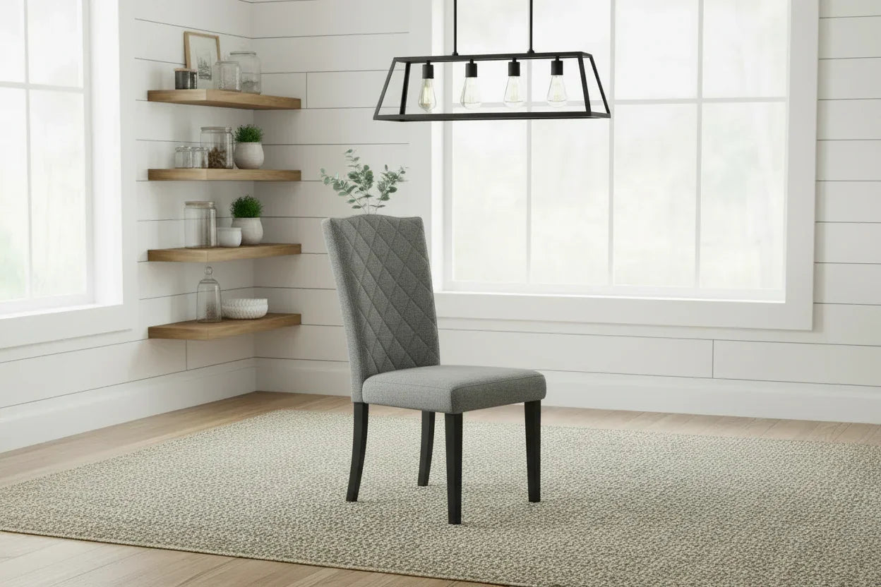 Dining room with wooden table and grey chairs in a well-lit room.