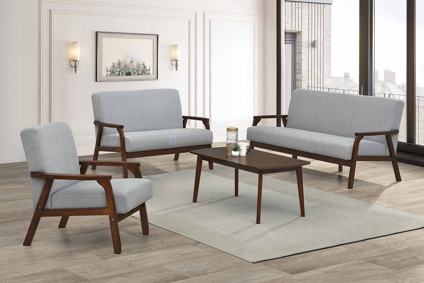 Modern living room set with gray upholstered chairs and sofa on a wooden floor.