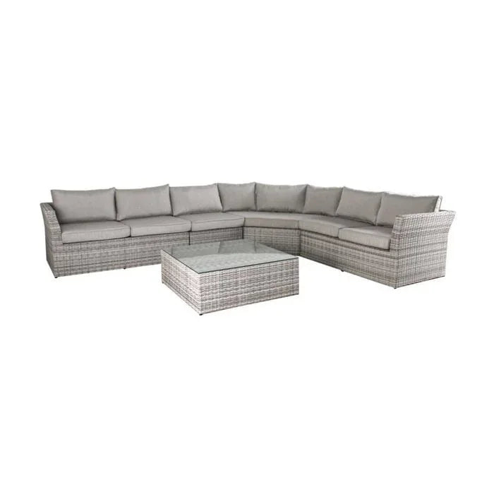 Sectional outdoor sofa with wicker frame and gray cushions on a white background