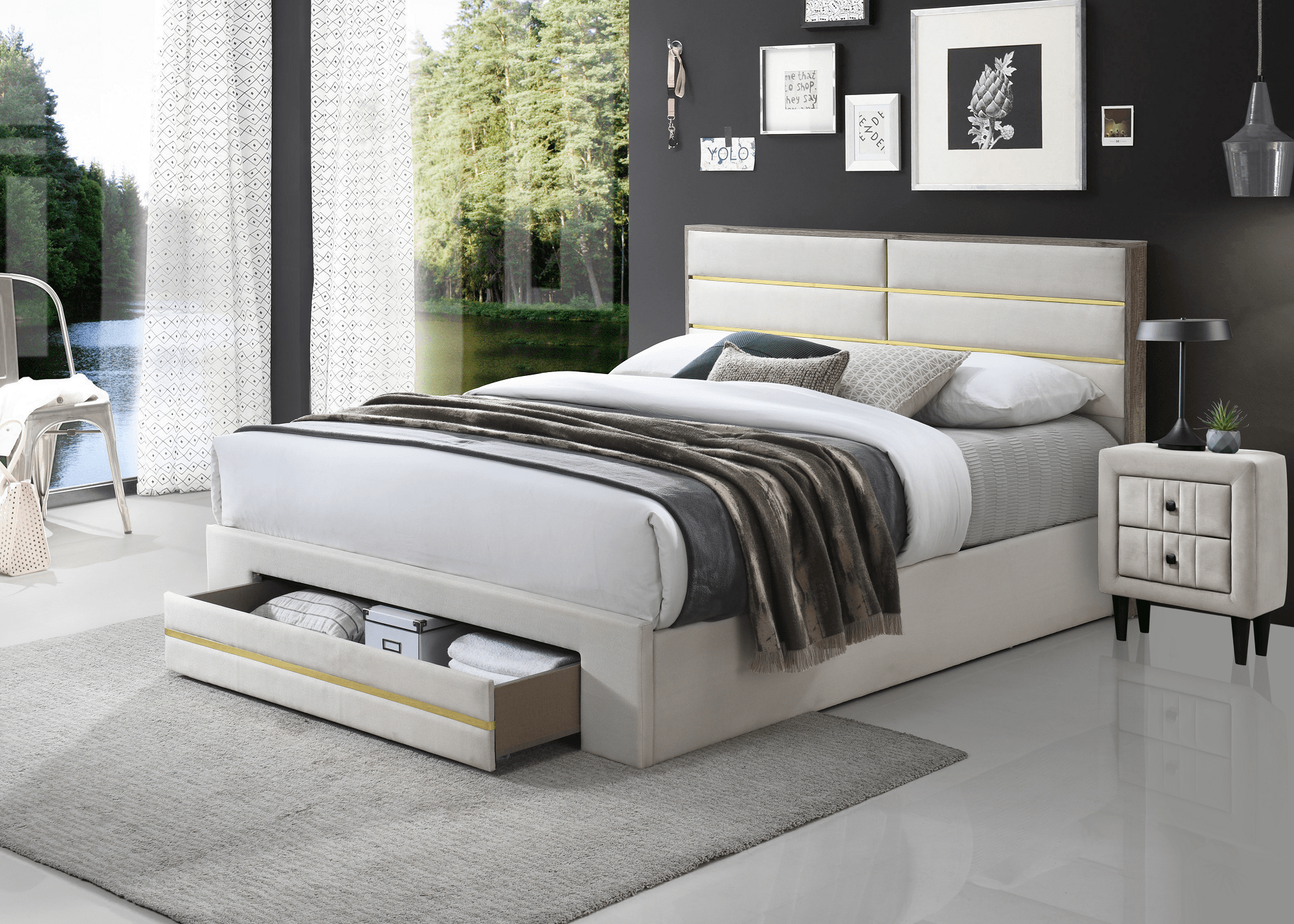 Modern upholstered grey bed with gold accents, storage drawer, and matching bedside table.