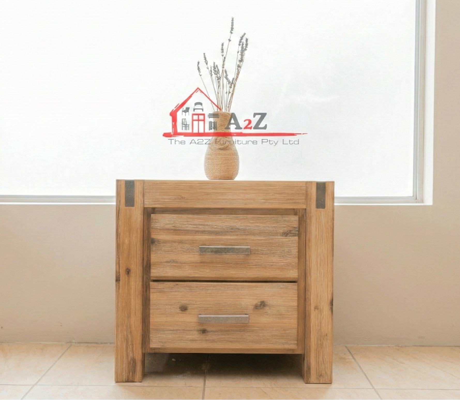 Wooden bedside table with two drawers in a room with a window and beige walls.