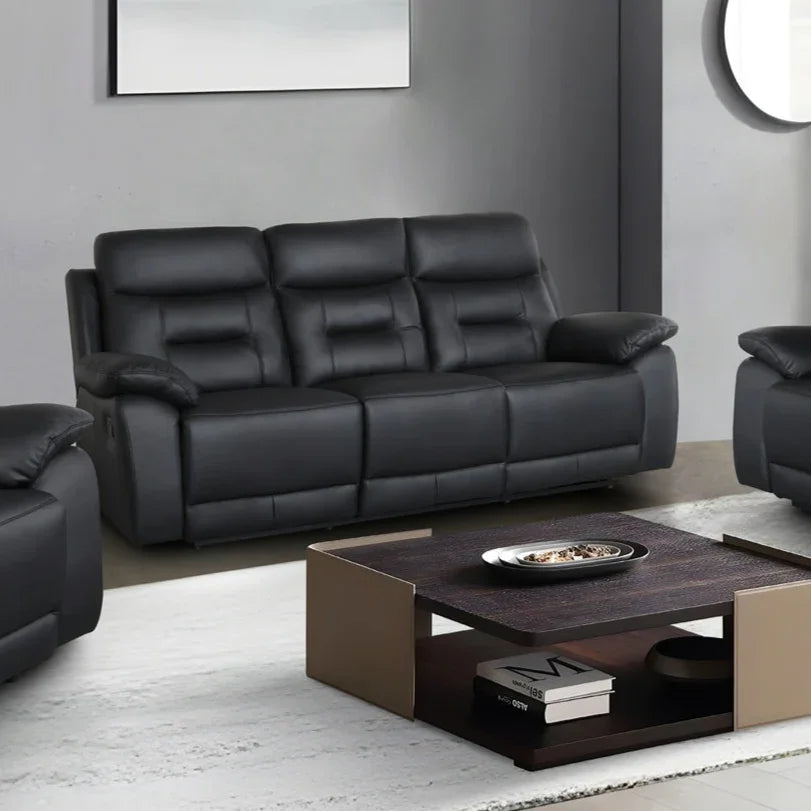 Modern black leather recliner sofa in living room with coffee table and contemporary decor