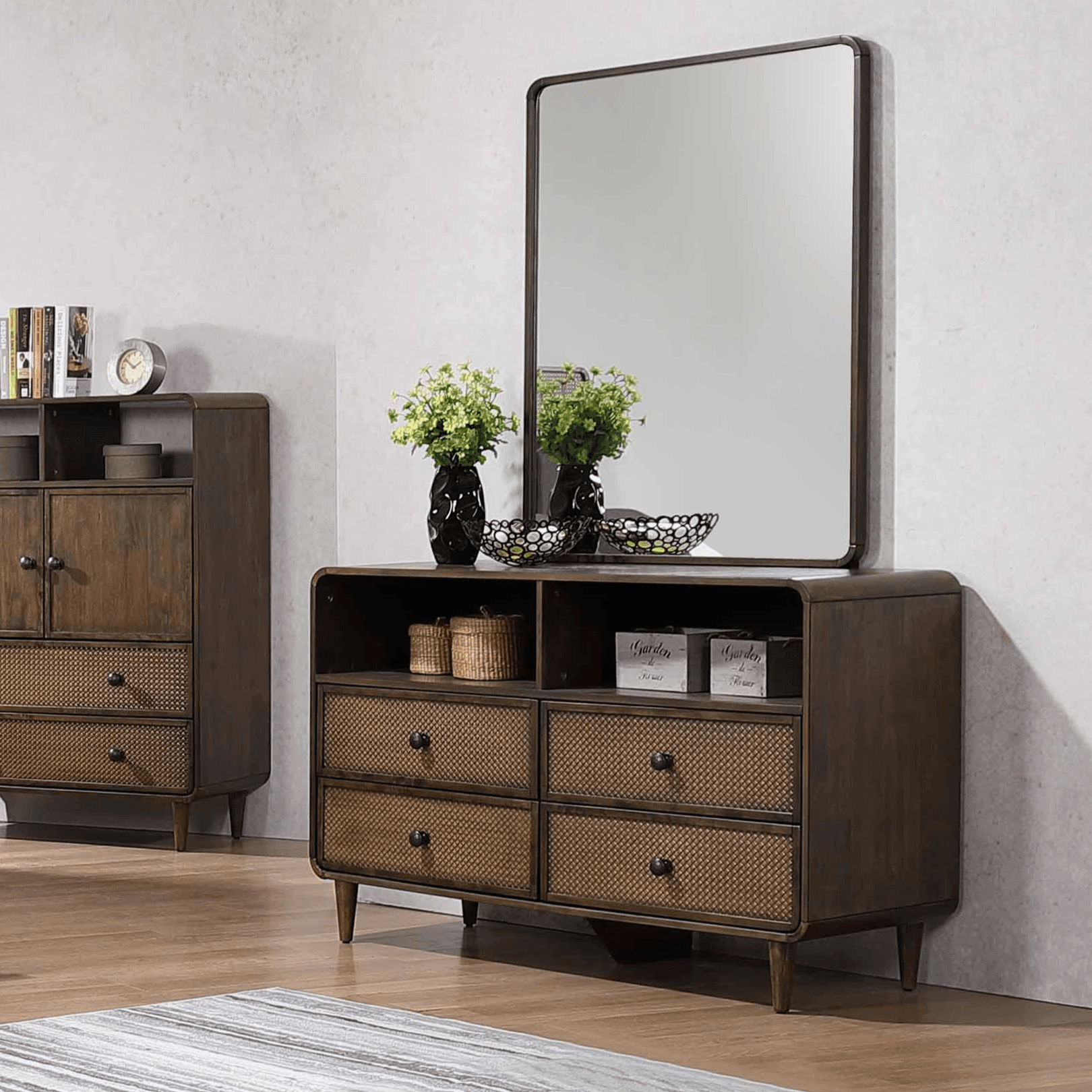 Wooden dresser with six drawers, open shelves, and large mirror in a modern bedroom setting