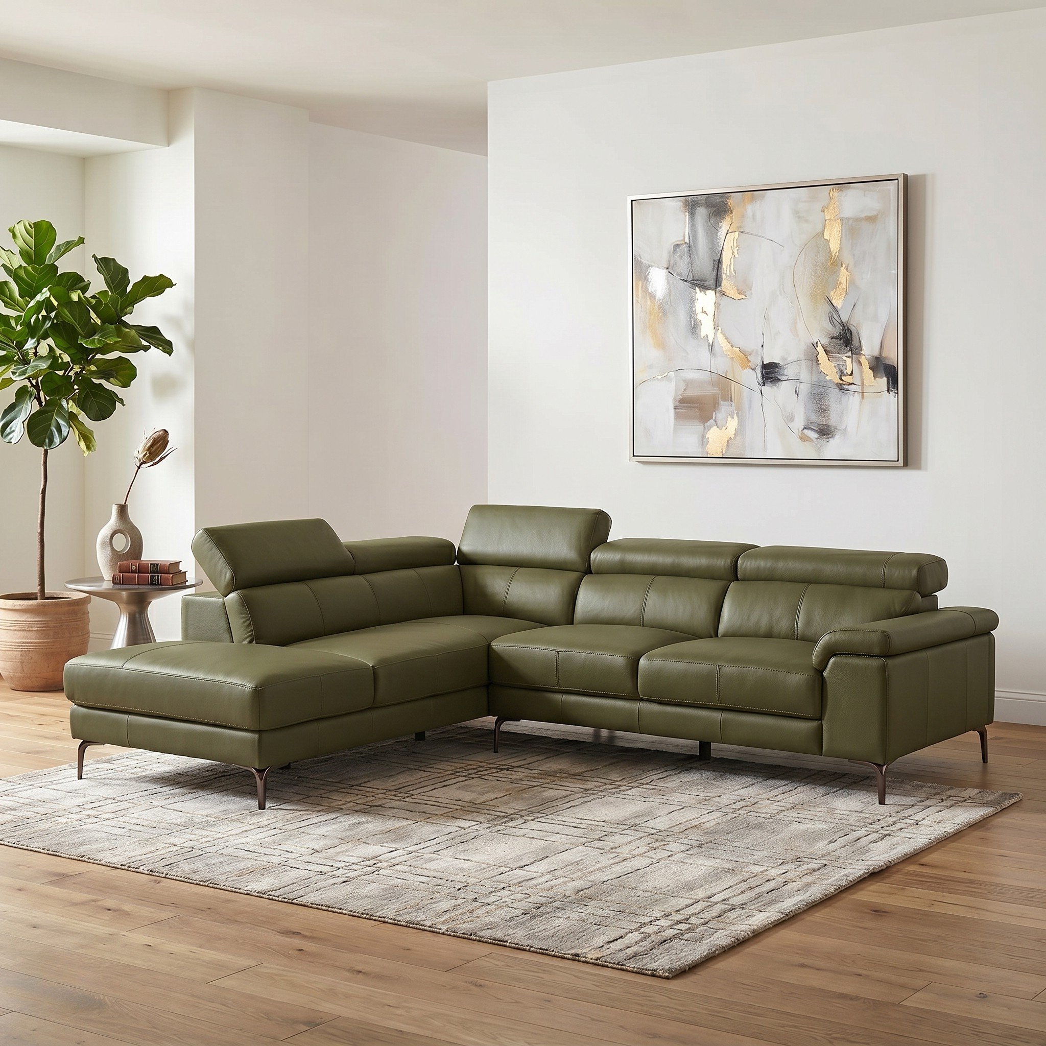 Olive leather sectional sofa in a living room with abstract art and plant decor.