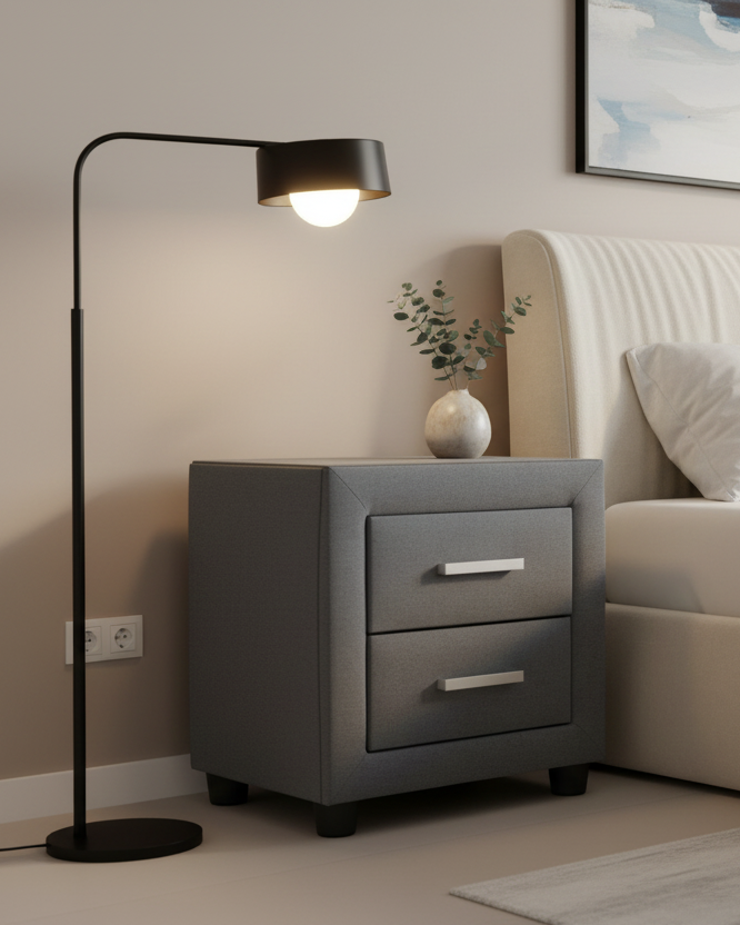 Modern bedroom with a bed, nightstand, and floor lamp.