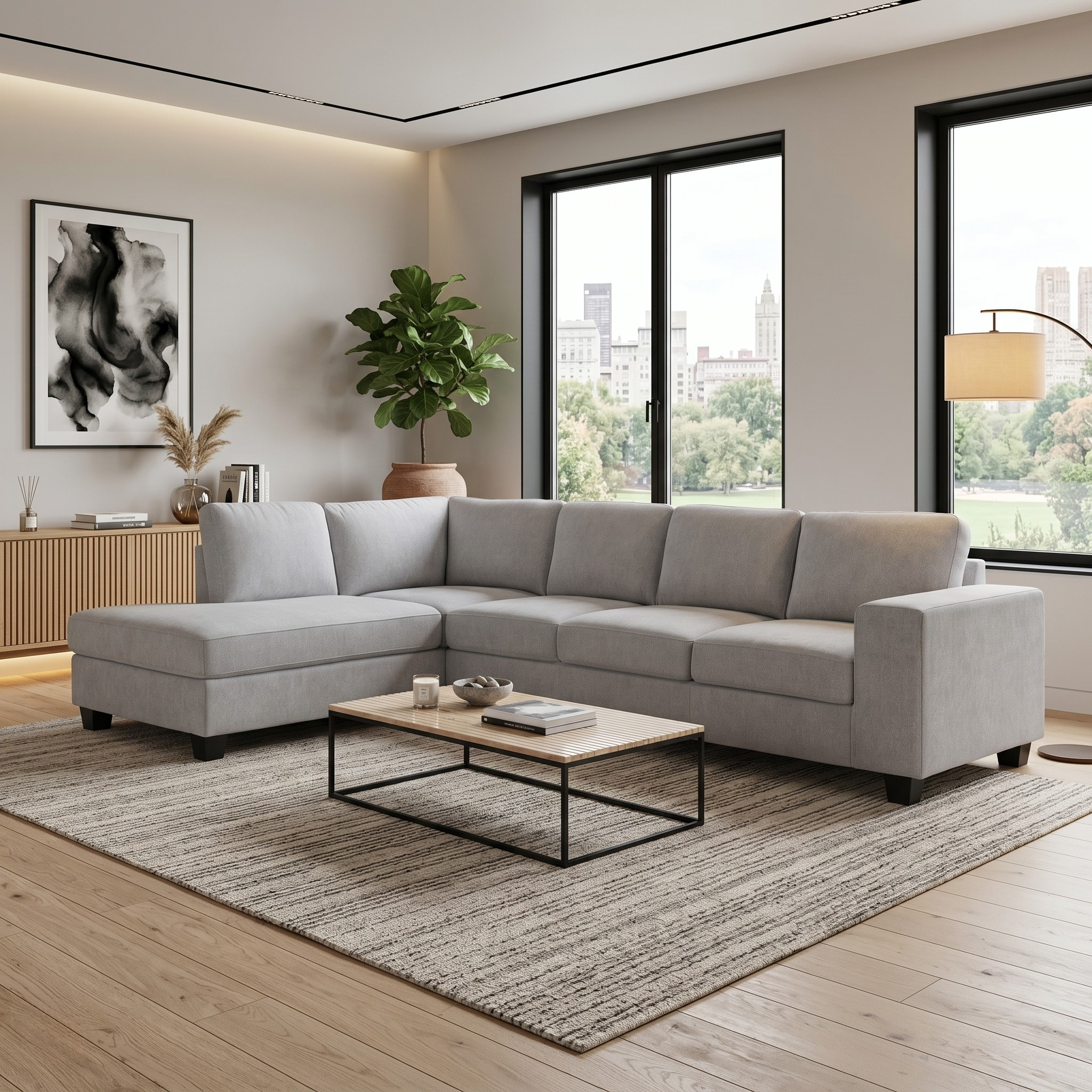 Marsden Corner Sofa in light gray upholstery placed in a modern living room with large windows, a wooden coffee table, textured rug, and minimalist decor.
