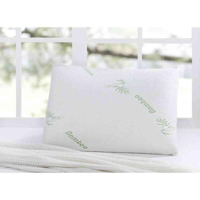 Mellow Pillow Bamboo Memory Foam Pillow with a breathable bamboo cover resting on a textured white surface near a bright window, promoting comfort and support.