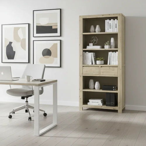 Modern home office with a desk, chair, and bookshelf against a white wall.