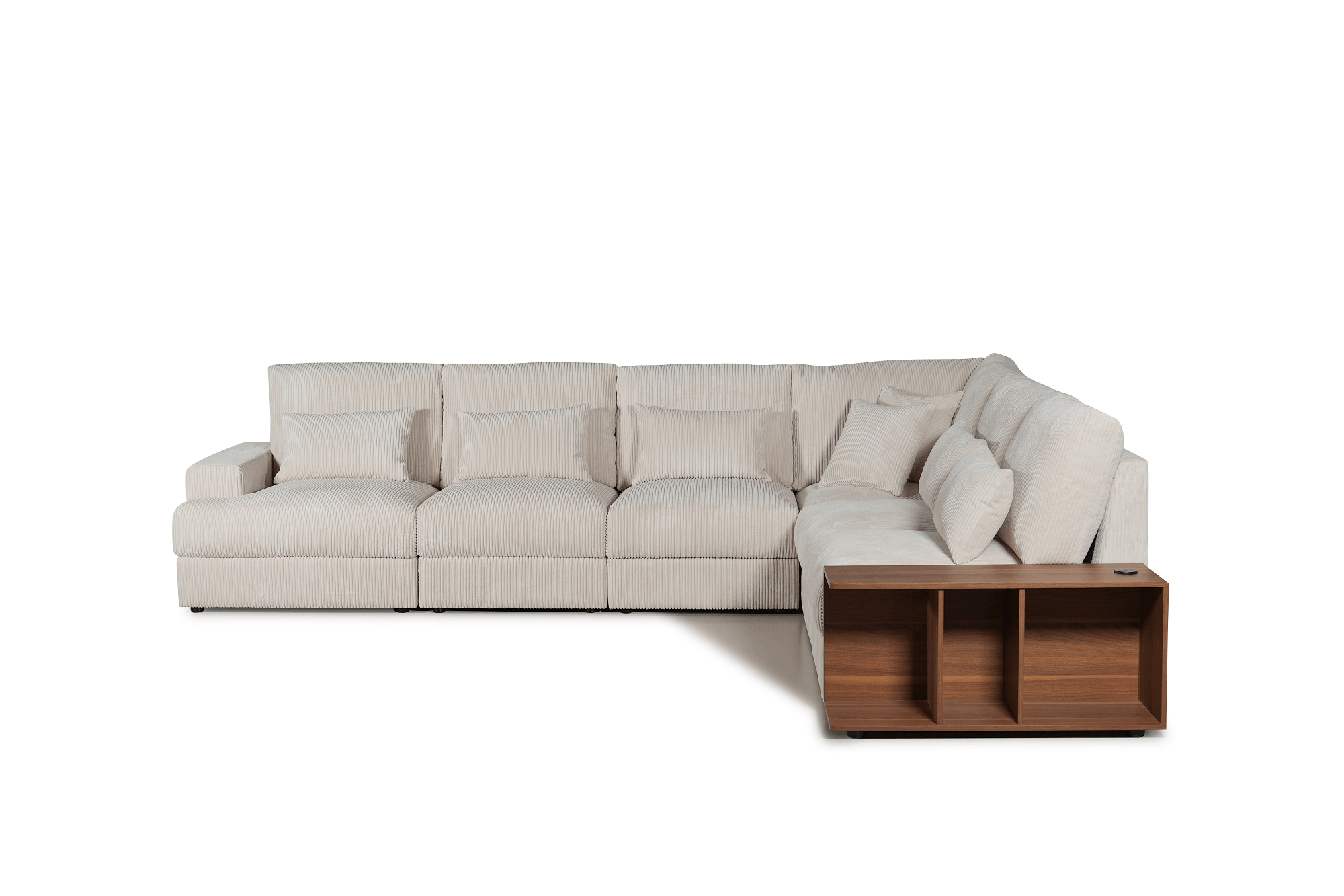 Modern beige corner lounge sofa with chaise, cushions, and built-in wooden side table shelving