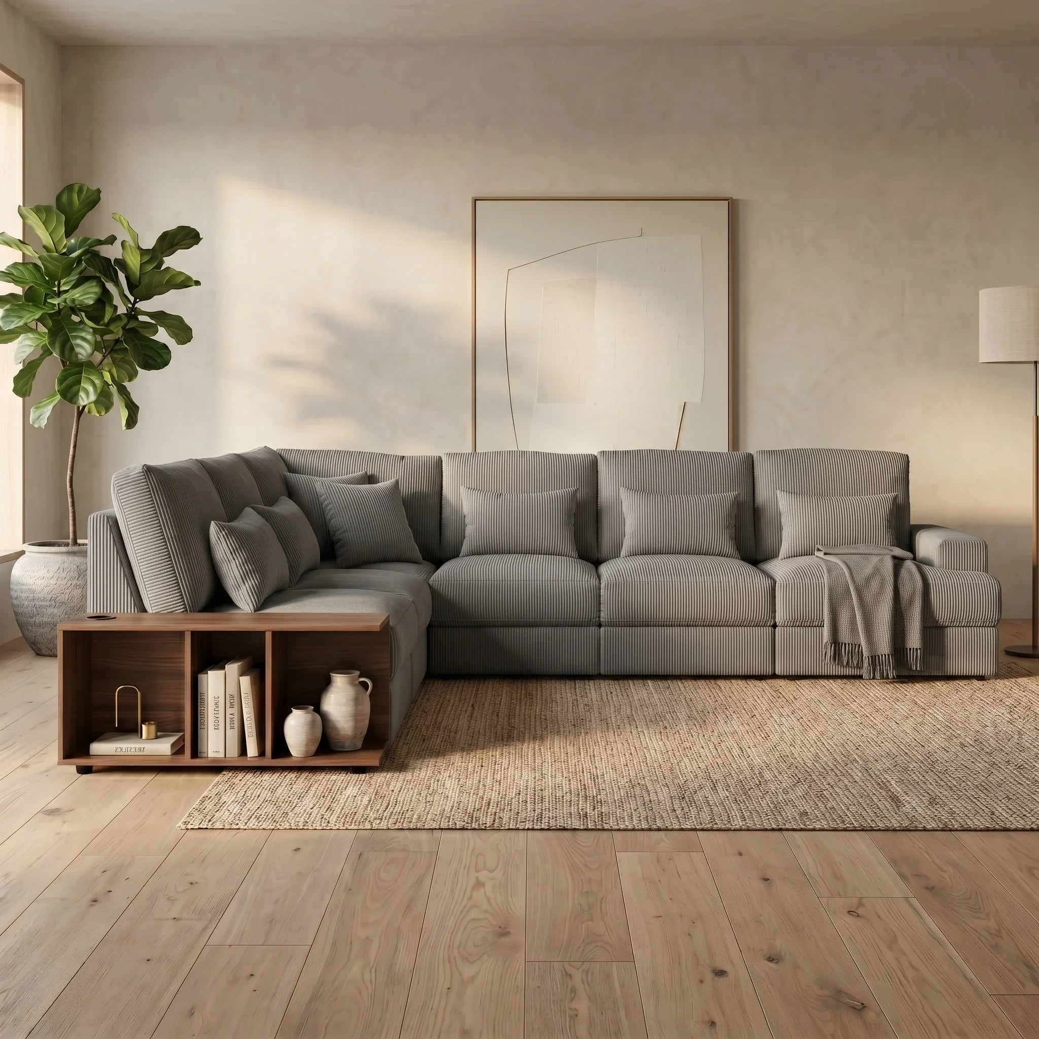 Opulence Corner Sofa in a modern living room setting, featuring soft gray upholstery, plush cushions, a wooden side shelf with decor, and neutral-toned accents for a cozy lounge atmosphere.
