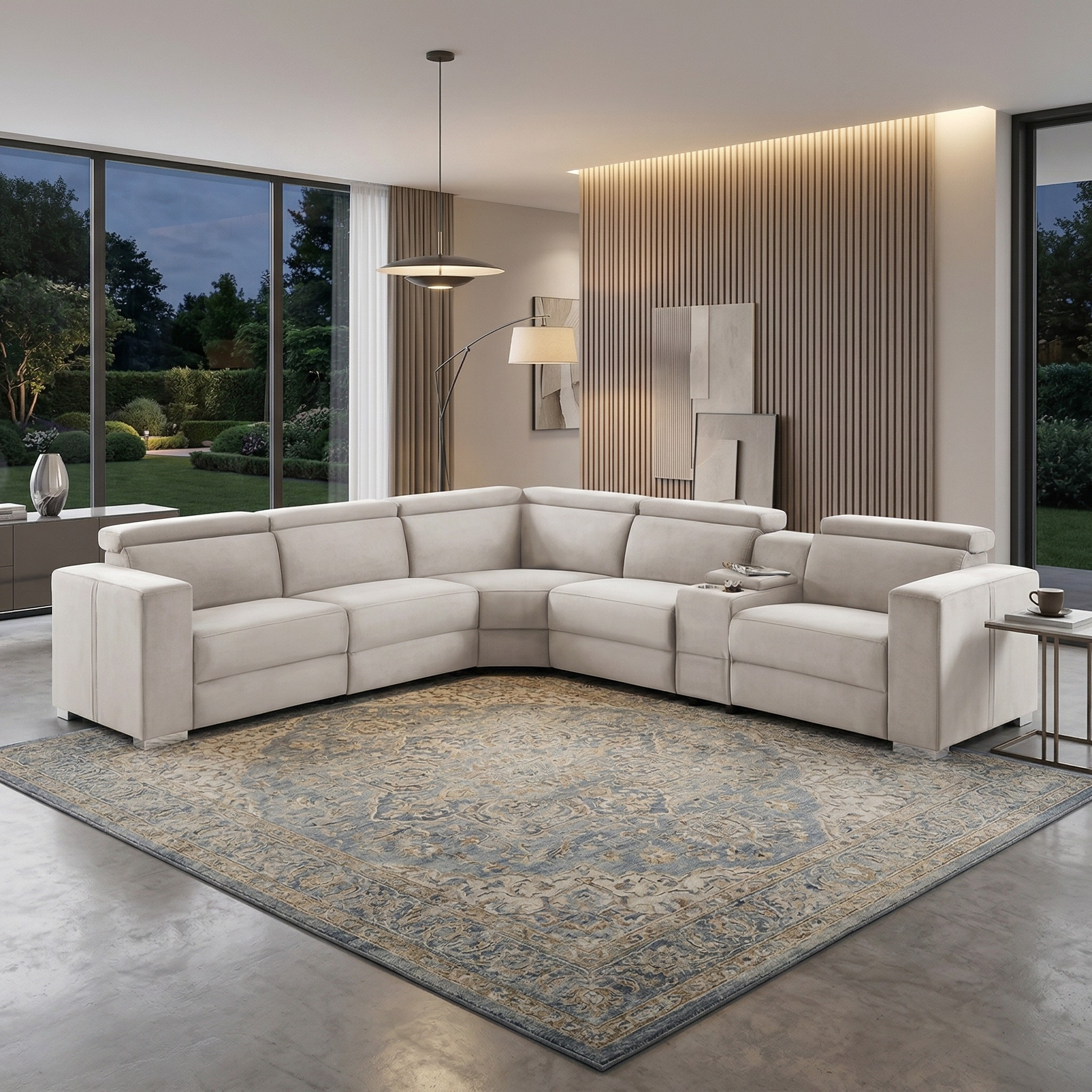 Modern living room featuring a spacious Sandringham Corner Recliner Lounge in light beige upholstery with recliner functions, styled with a decorative rug and minimalist decor.