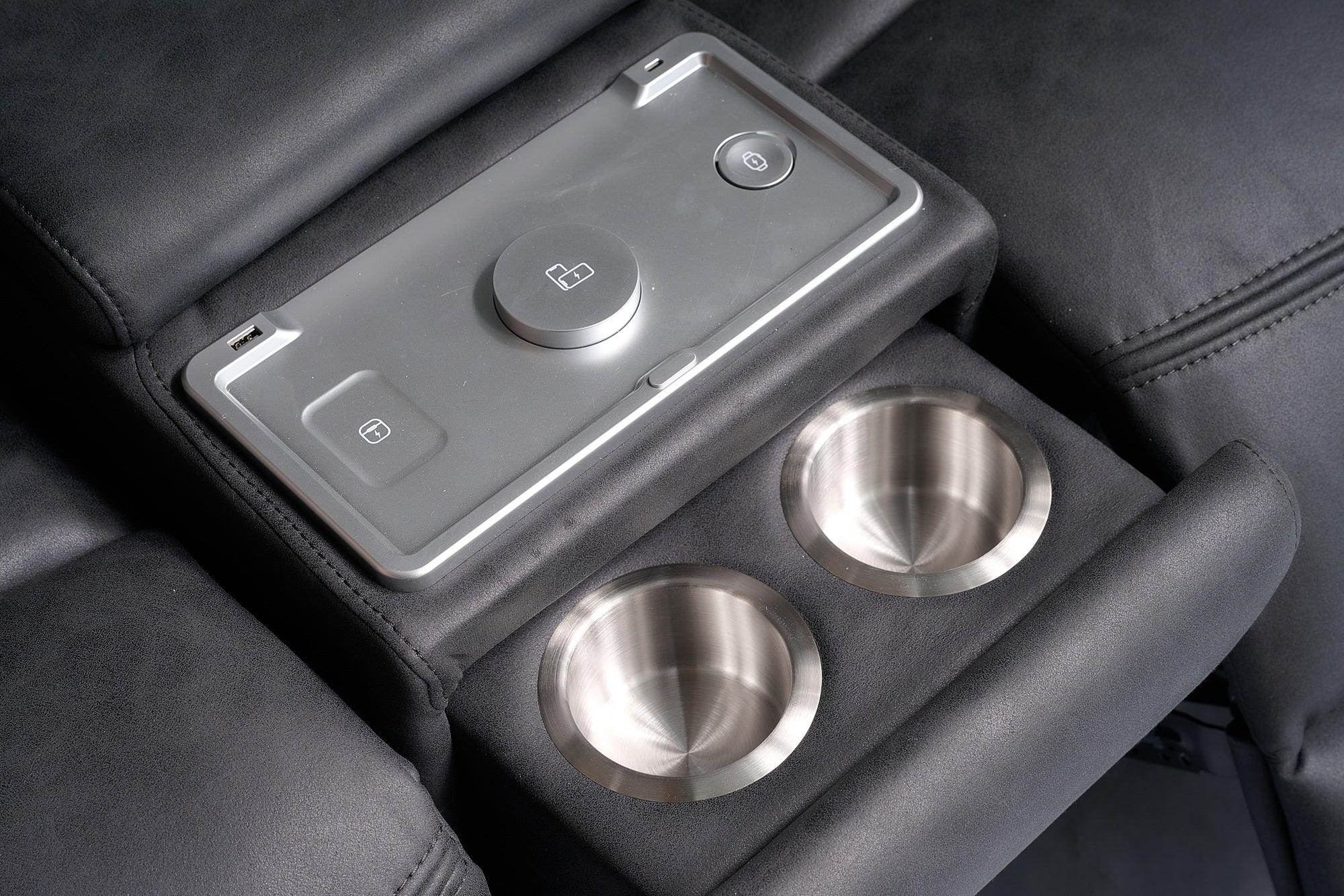 Black recliner sofa armrest with stainless steel cup holders and USB charging port