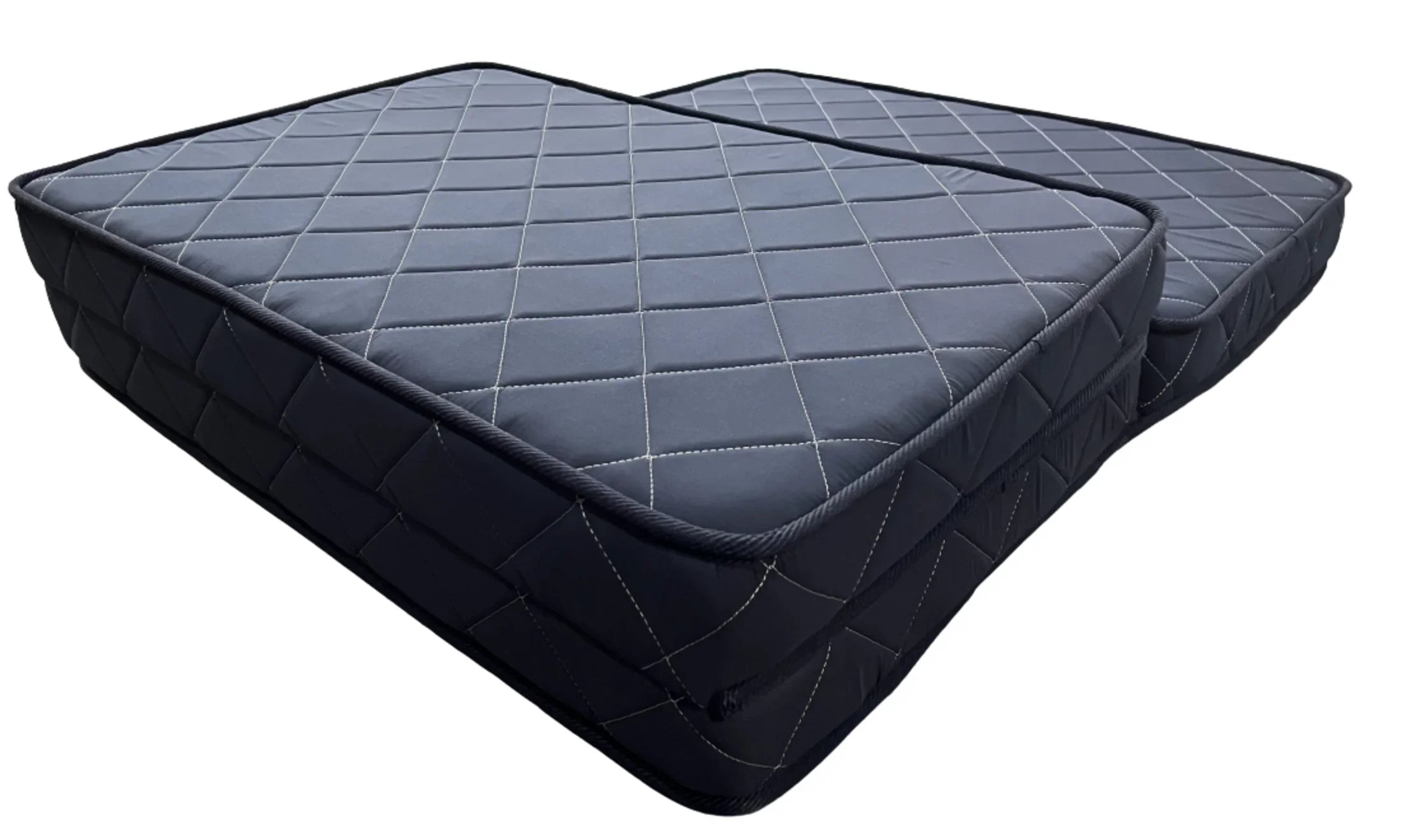 Gray quilted mattress on a white background