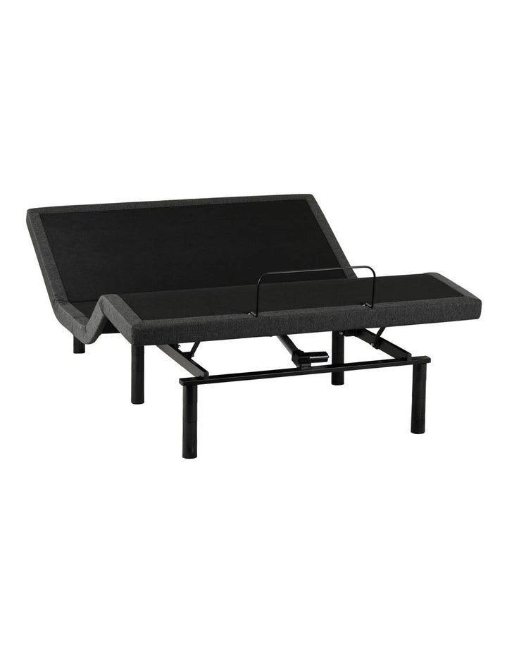 Adjustable bed base with metal legs and ergonomic frame on white background