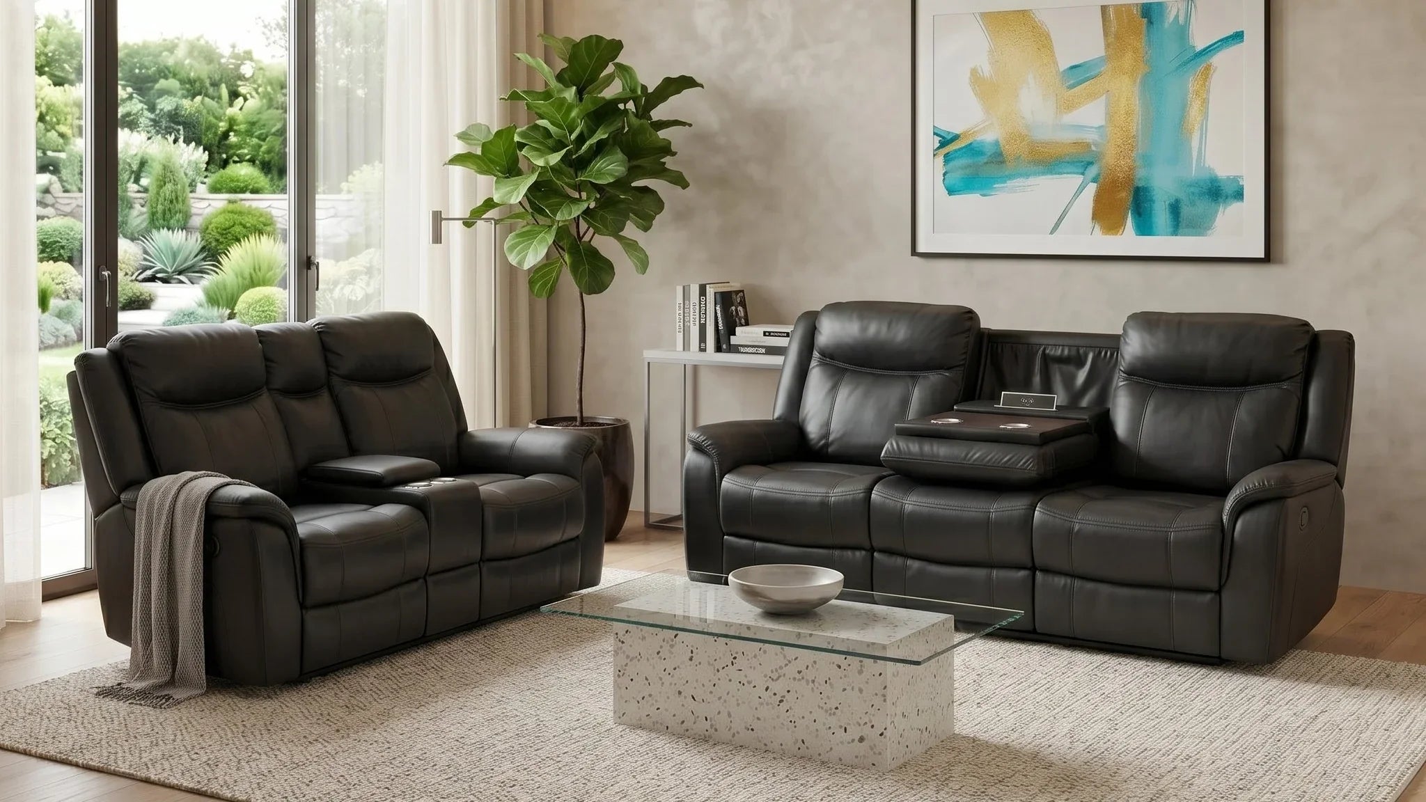 Modern living room with black leather sofas, a glass coffee table, and decorative elements.