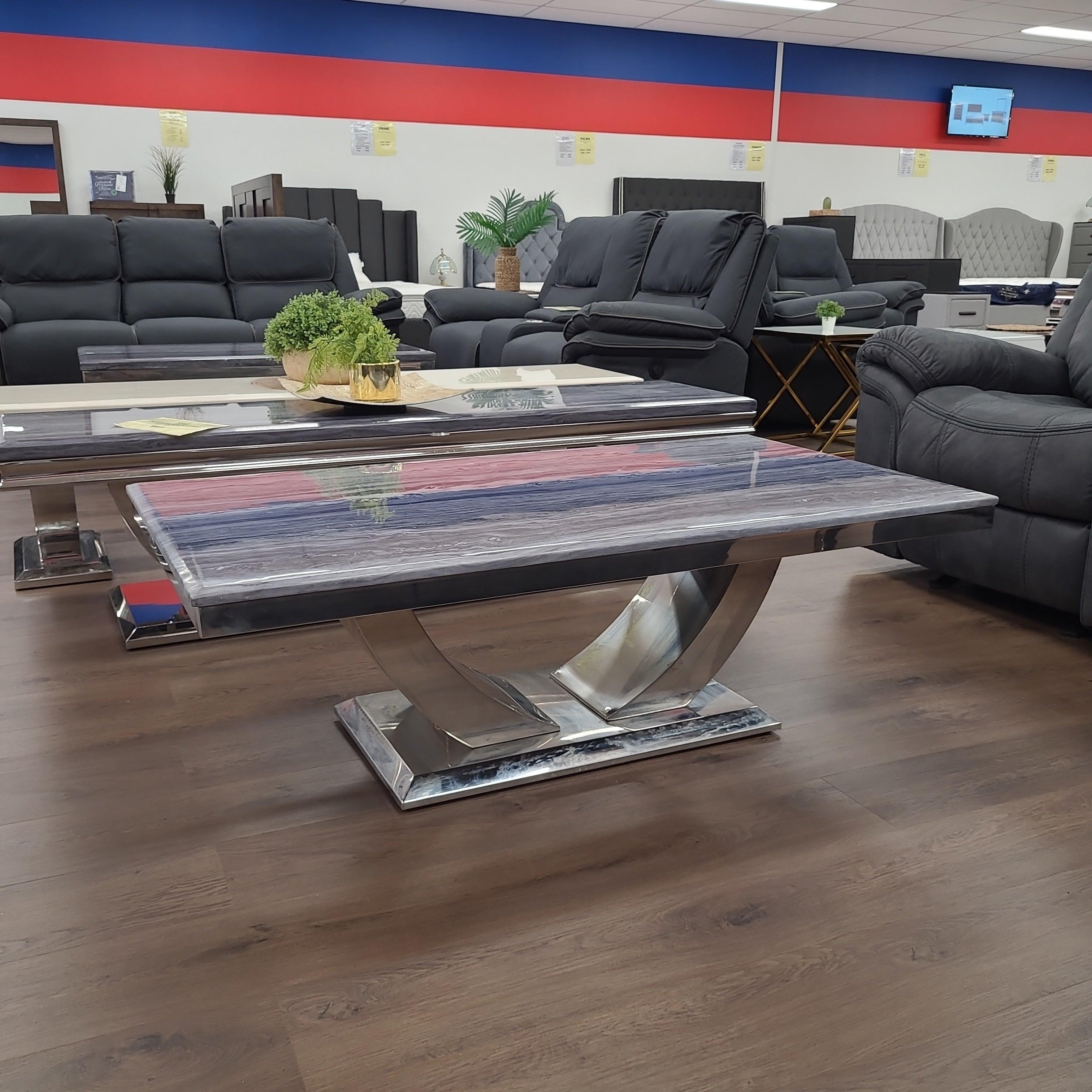 Image of The A2Z Furniture's Zone Coffee Table featuring a grey marble top and stainless steel structure. The rectangular coffee table has a modern design and is the perfect addition to any living space.