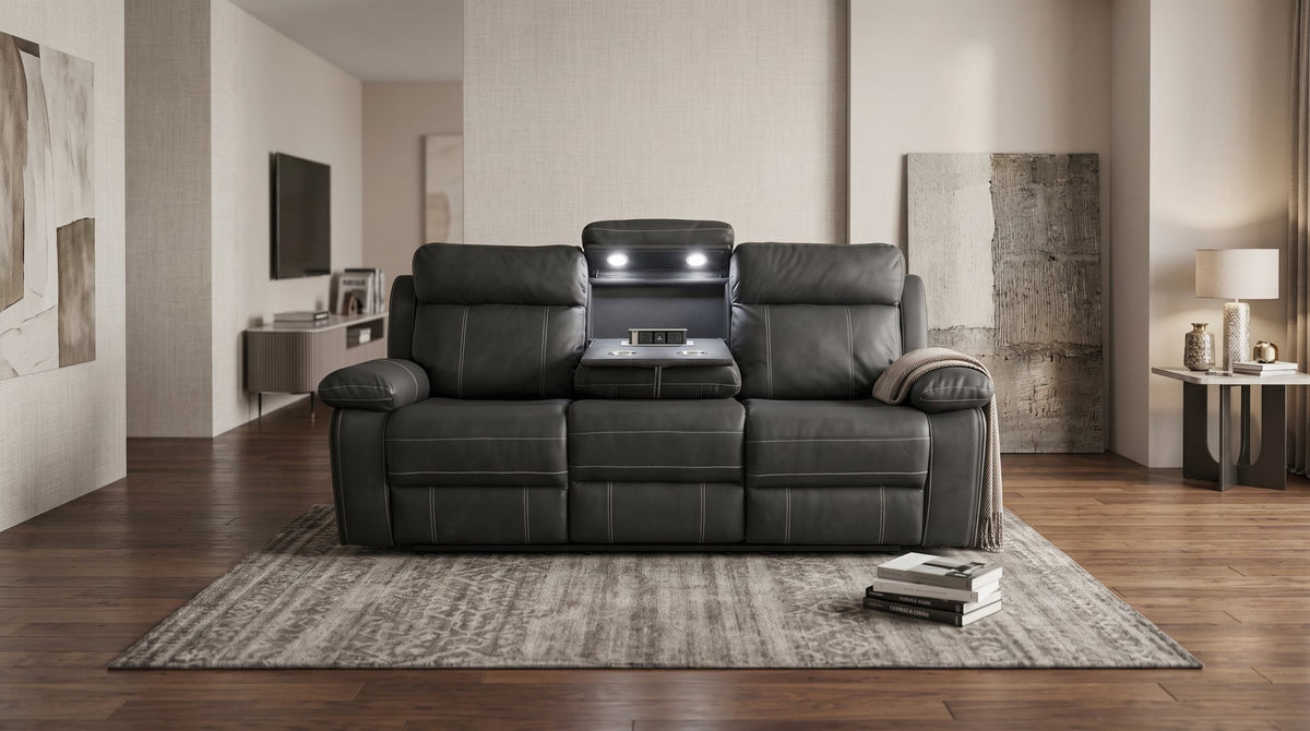 Bentley 3 seater recliner in black with a lit centre console in a warm living room