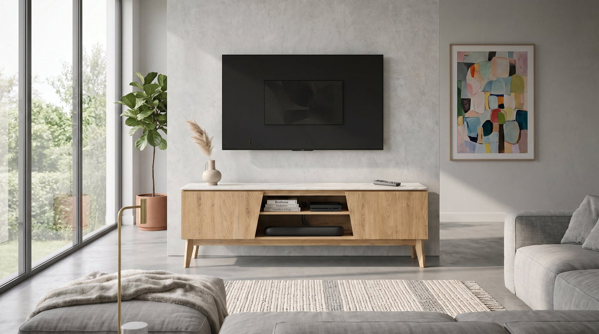 Macleod TV unit with timber doors and an open shelf under a wall-mounted TV in a bright living room