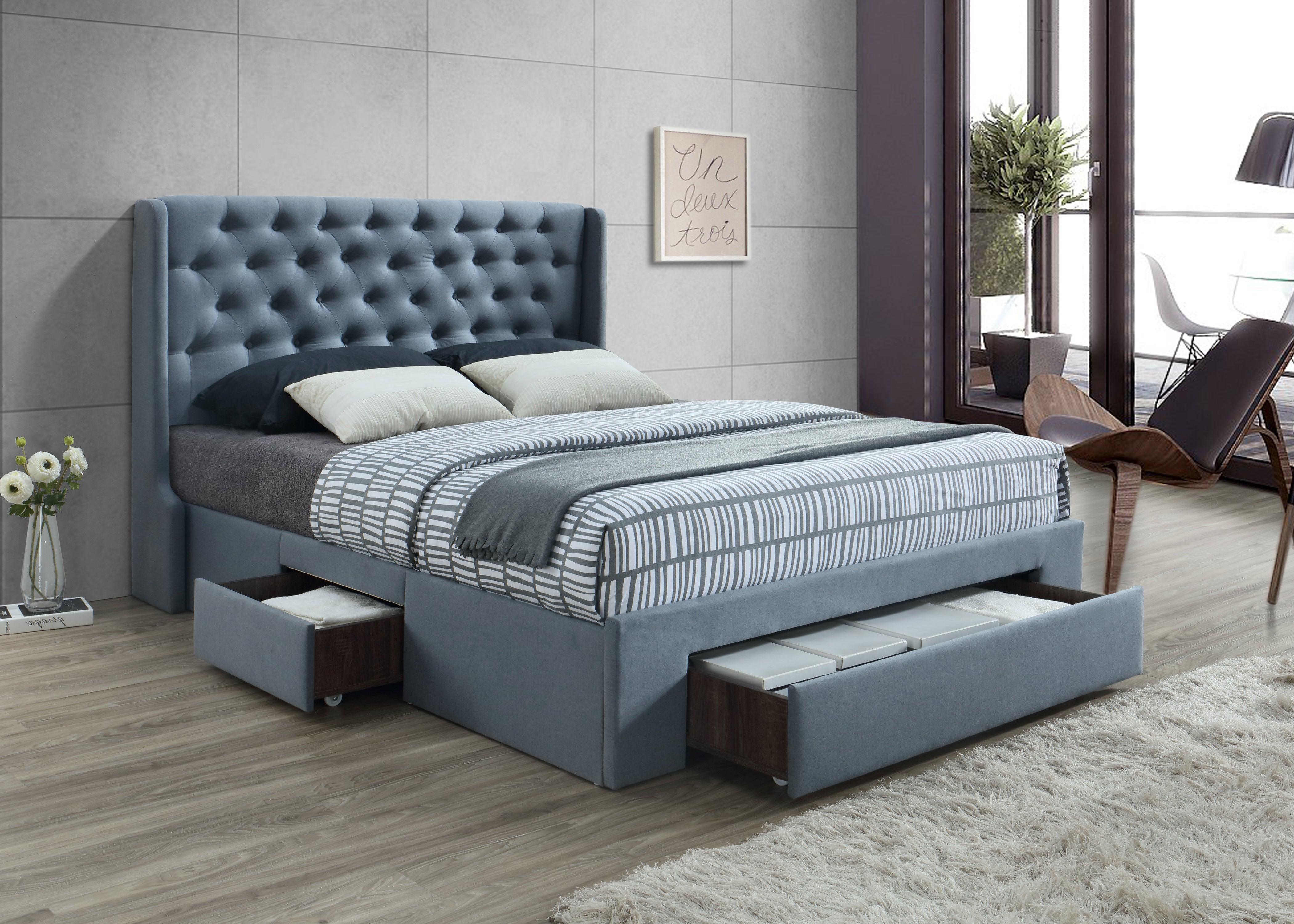 A modern queen bed with built-in drawers offers ample storage and a clutter-free bedroom.