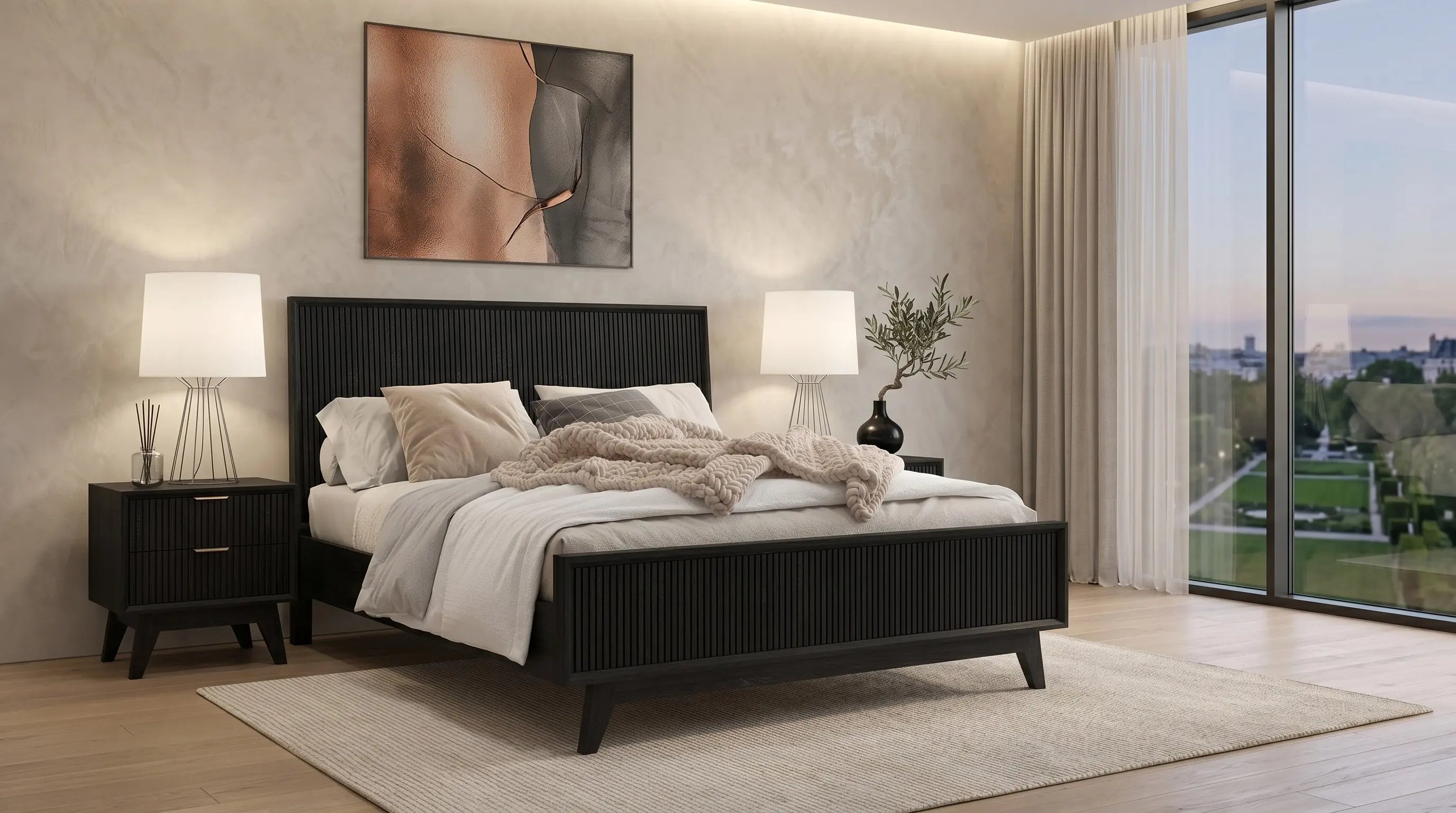 Modern bedroom with a black bed, nightstands, and lamps.